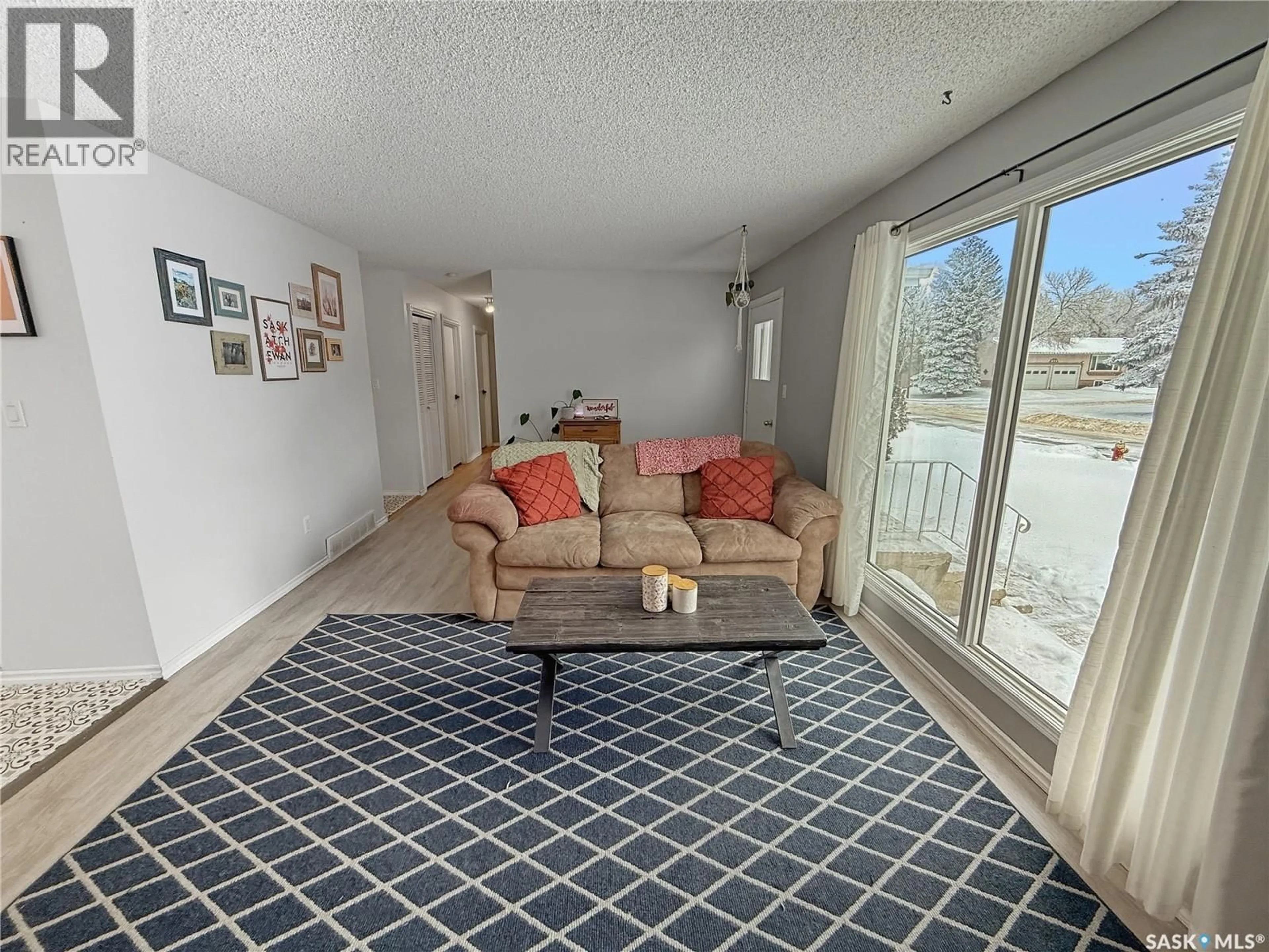 Living room with furniture, unknown for 413 HAYES DRIVE, Swift Current Saskatchewan S9H4H2