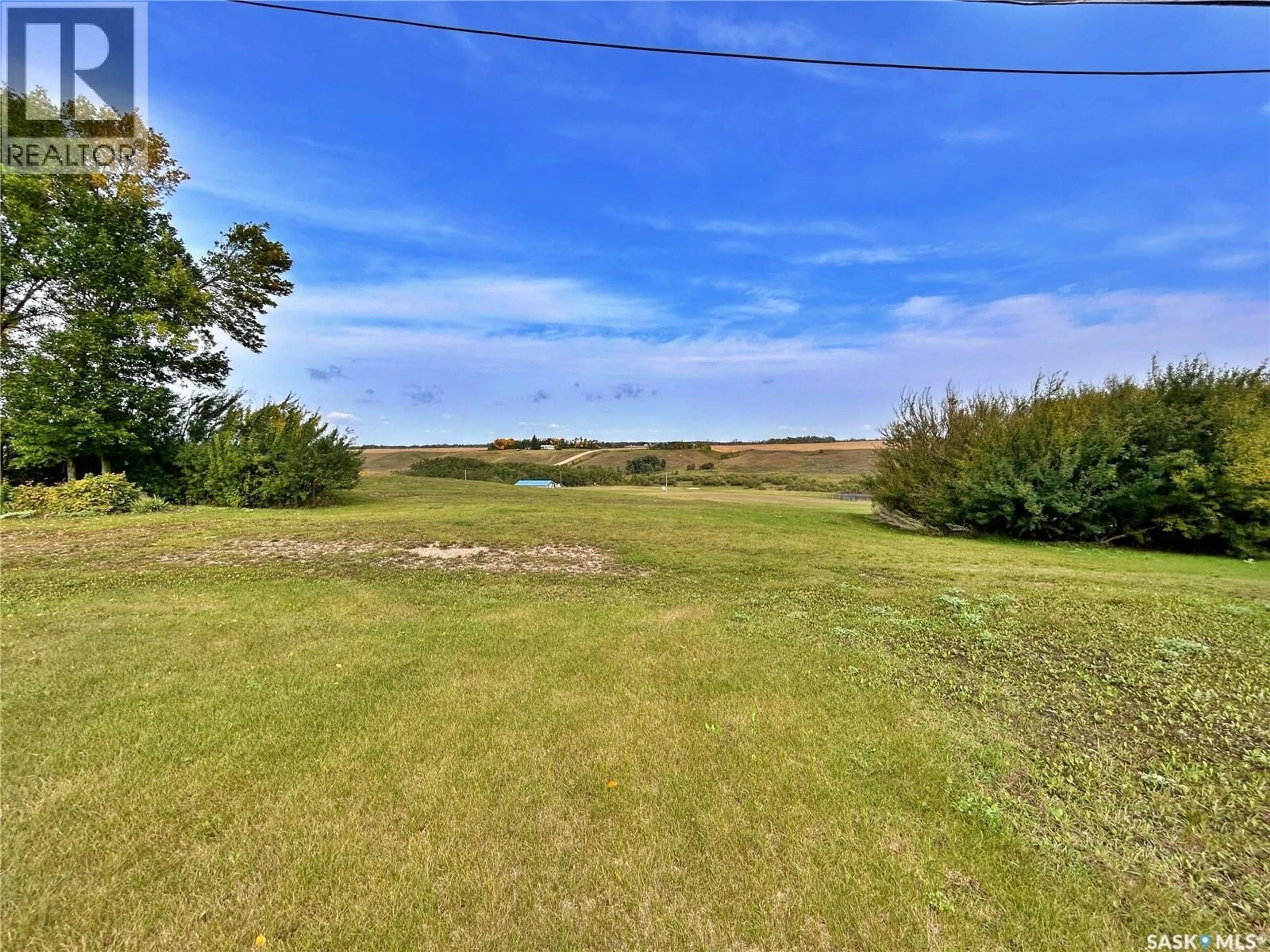 A pic from outside/outdoor area/front of a property/back of a property/a pic from drone, water/lake/river/ocean view for 107 CLEMENTS AVENUE, Wawota Saskatchewan S0G5A0
