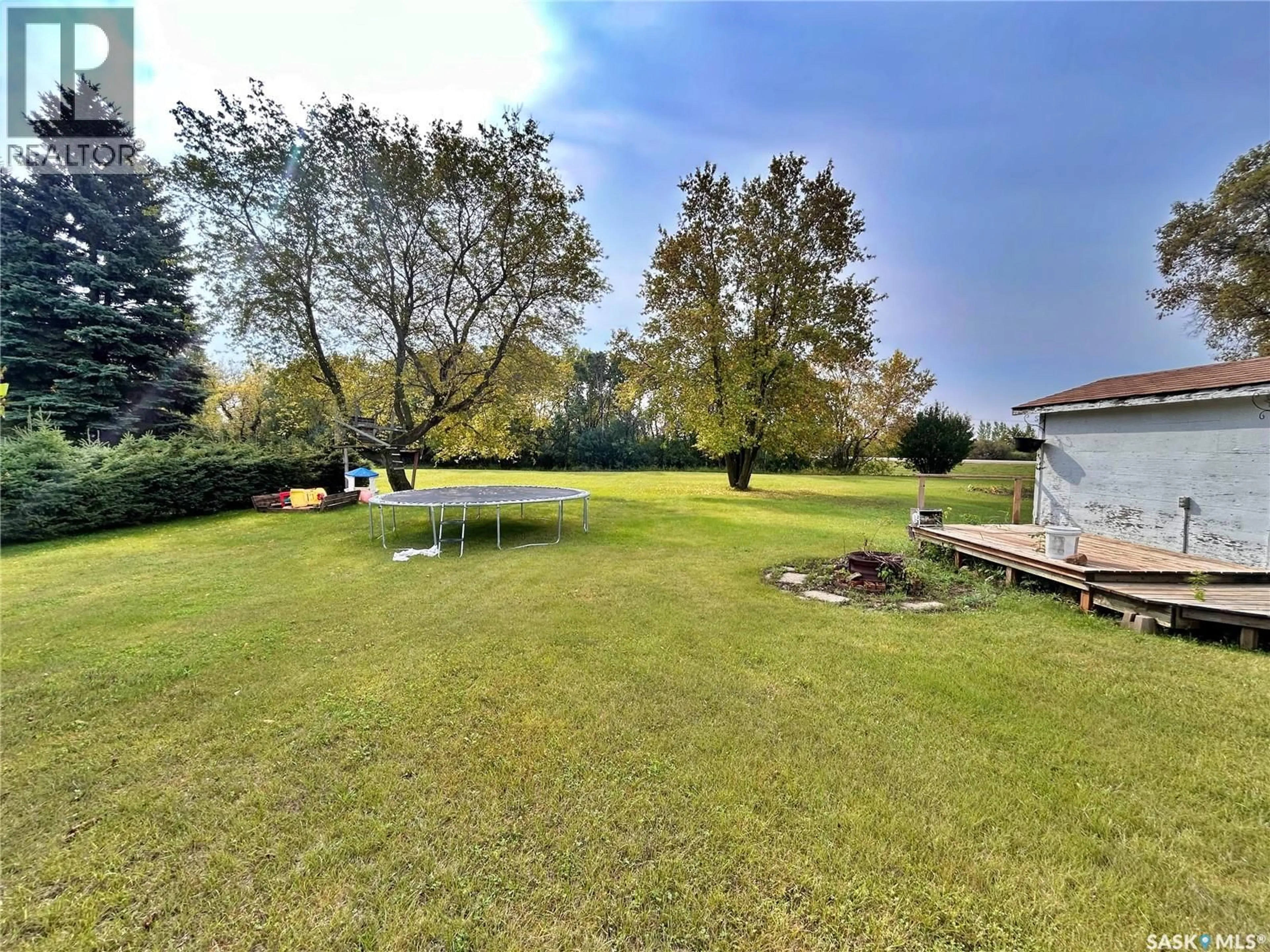 A pic from outside/outdoor area/front of a property/back of a property/a pic from drone, water/lake/river/ocean view for 230 RAILWAY AVENUE, Wawota Saskatchewan S0G5A0