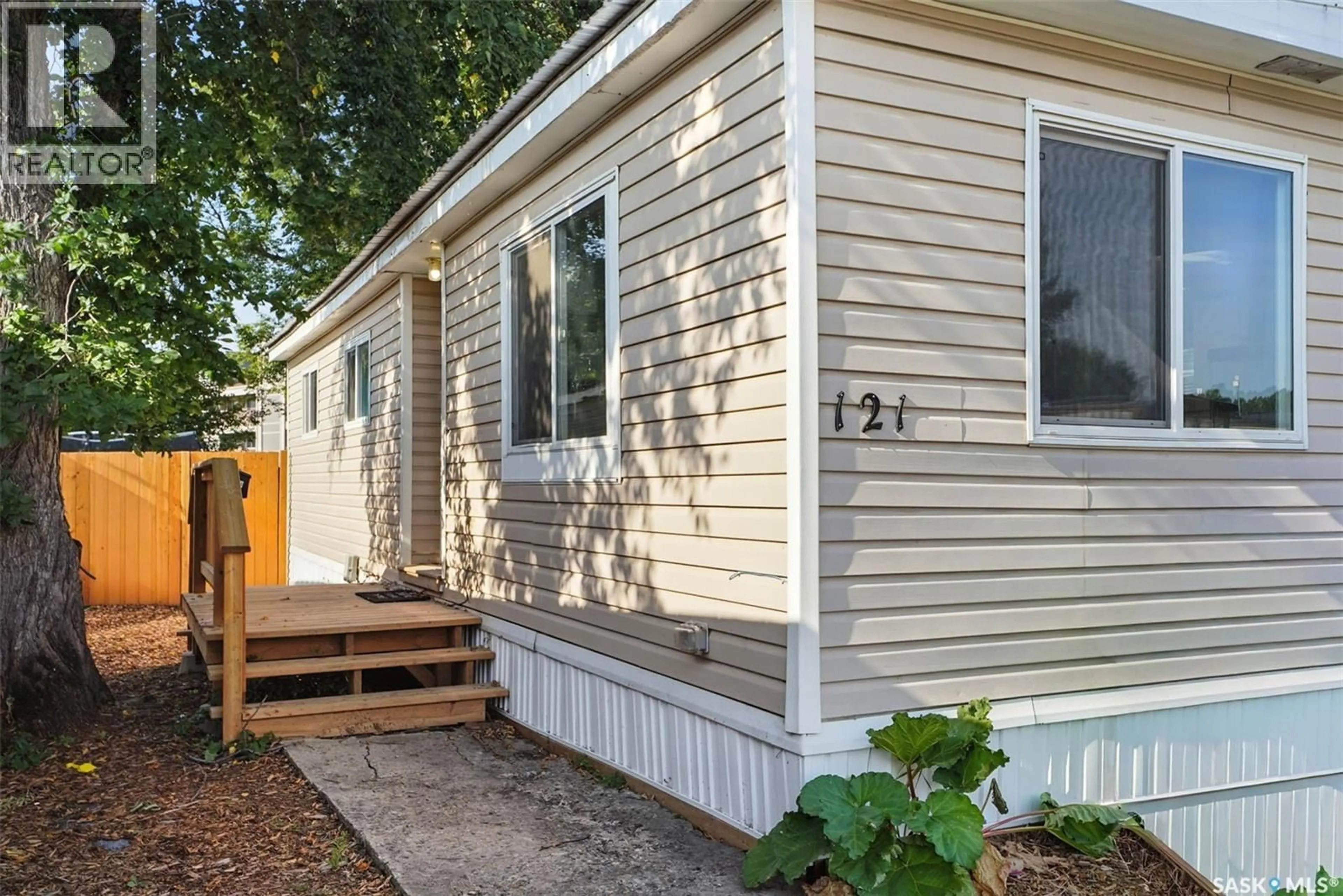 Home with vinyl exterior material, street for 121 219 GRANT STREET, Saskatoon Saskatchewan S7N2A5