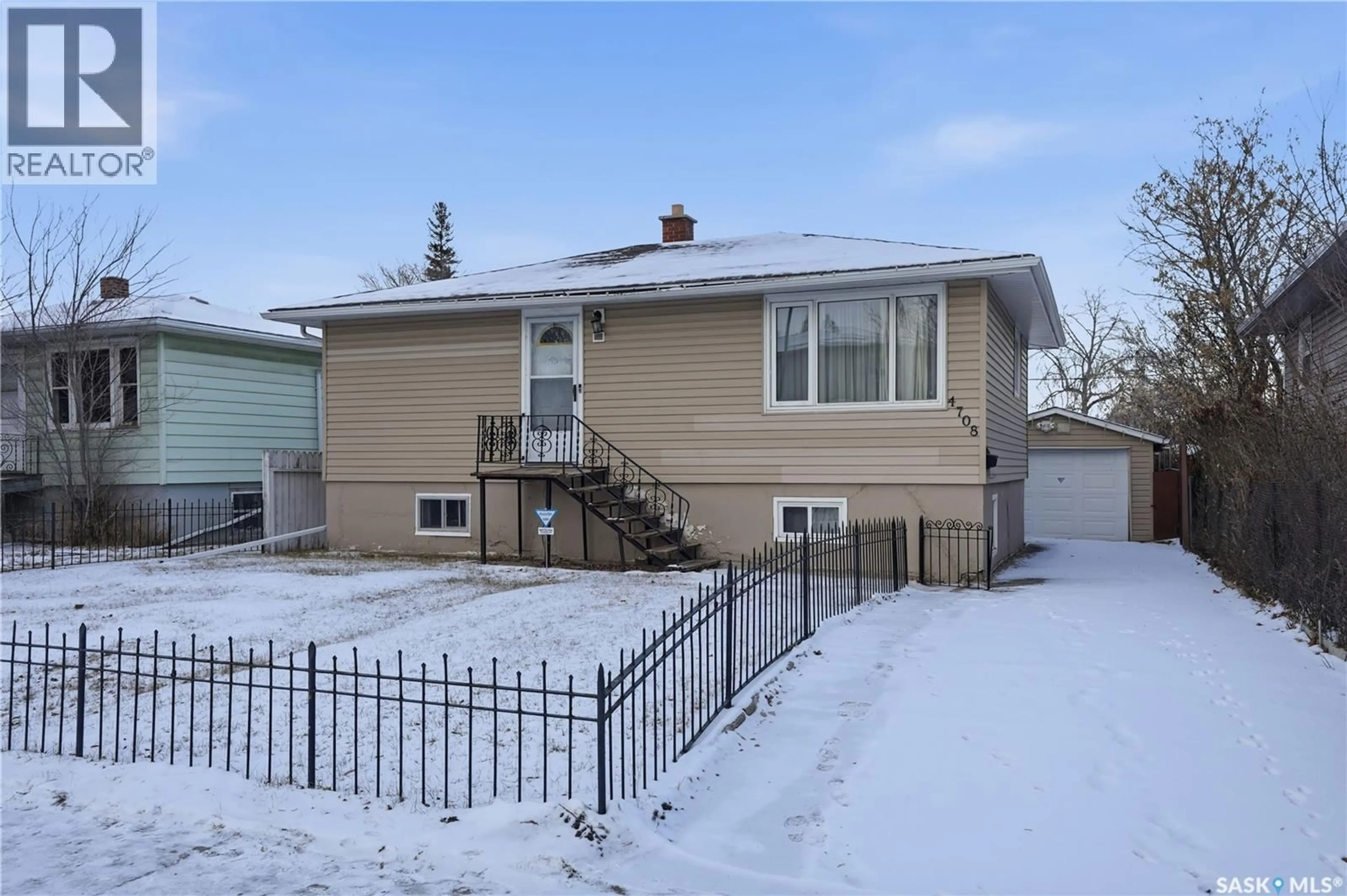 Home with vinyl exterior material, street for 4708 4TH AVENUE, Regina Saskatchewan S4T0J1