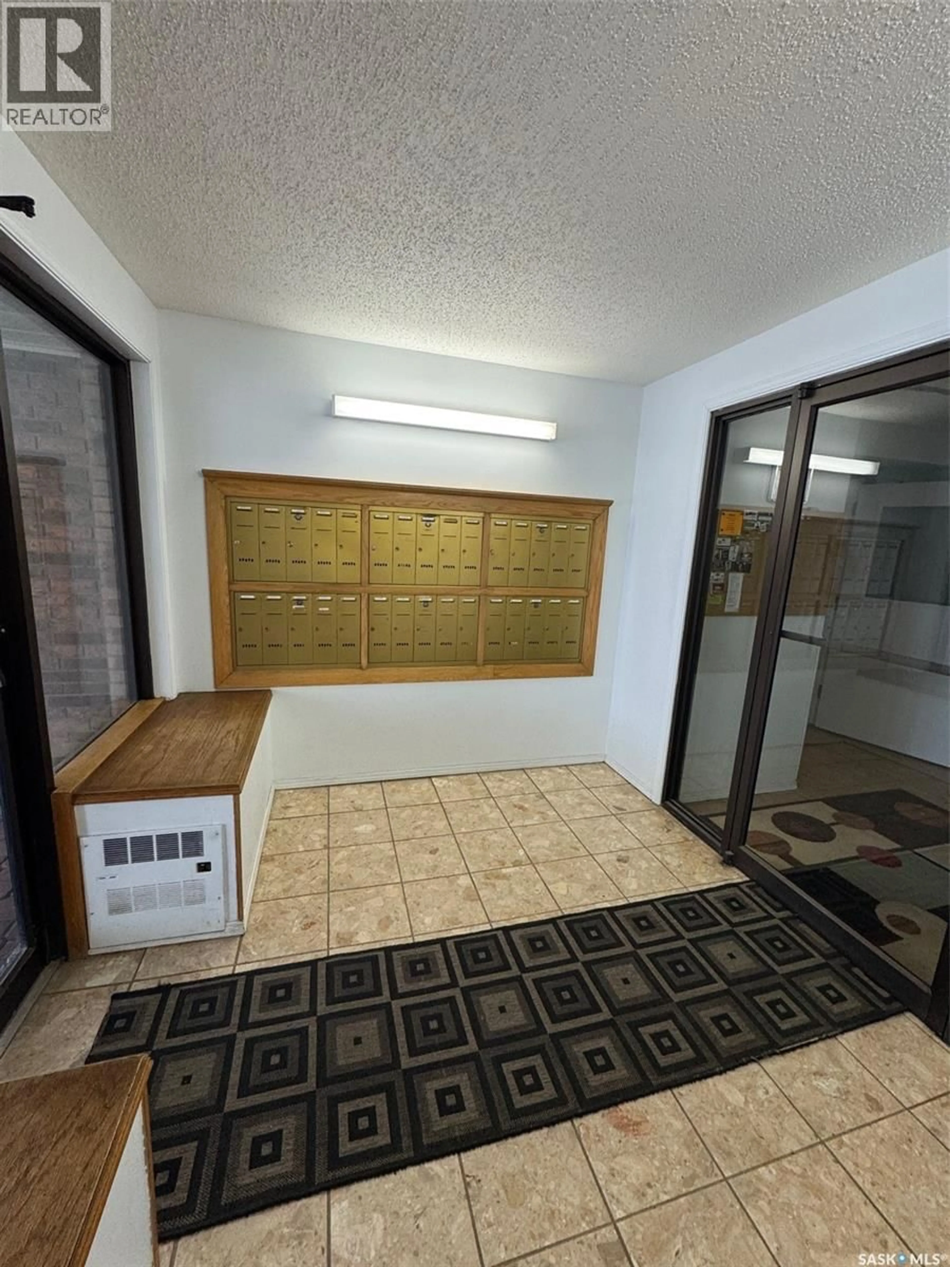 Indoor foyer for 209 - 1442 102ND STREET, North Battleford Saskatchewan S9A1G7