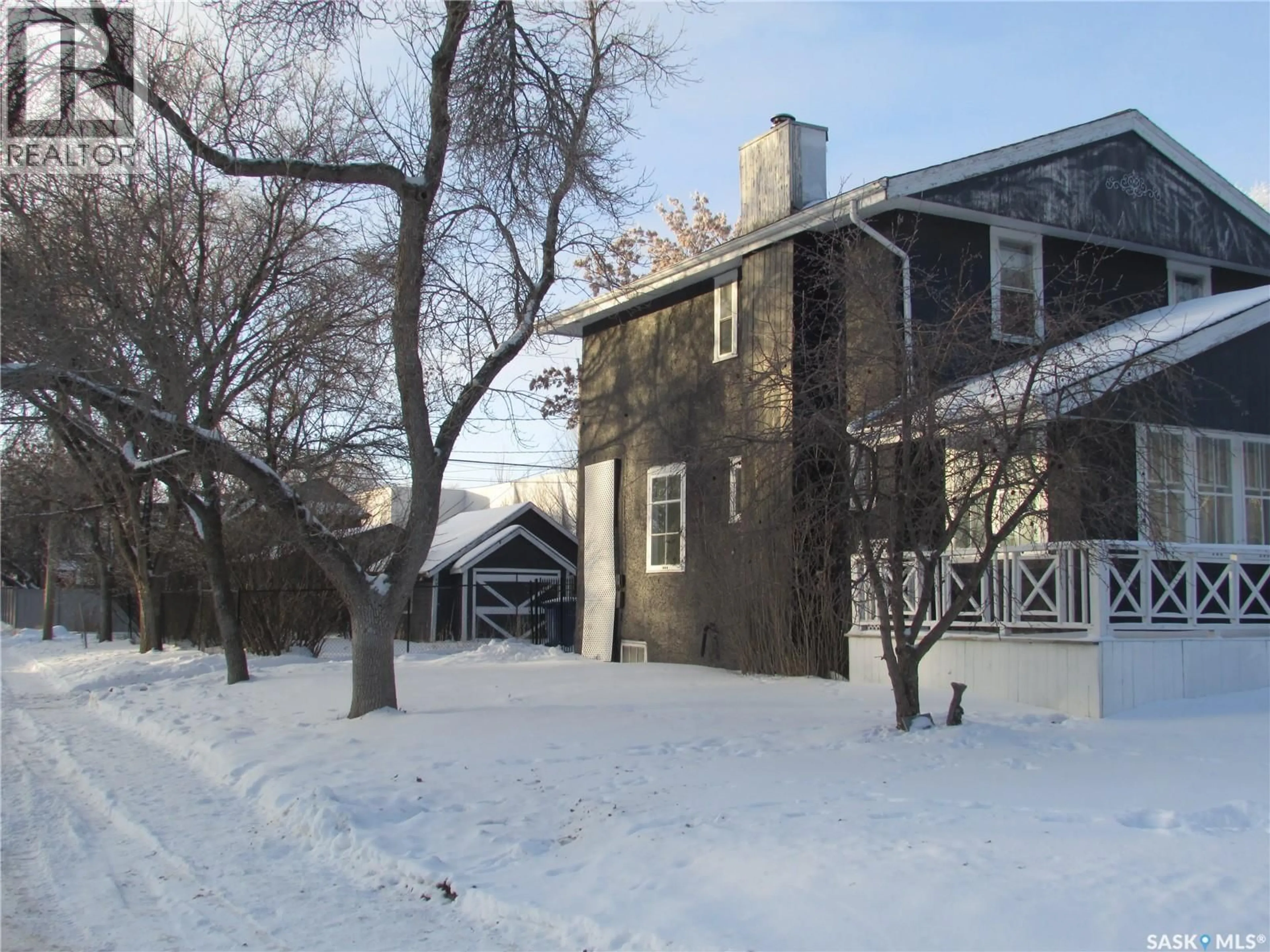 A pic from outside/outdoor area/front of a property/back of a property/a pic from drone, street for 2678 ROBINSON STREET, Regina Saskatchewan S4T2R4