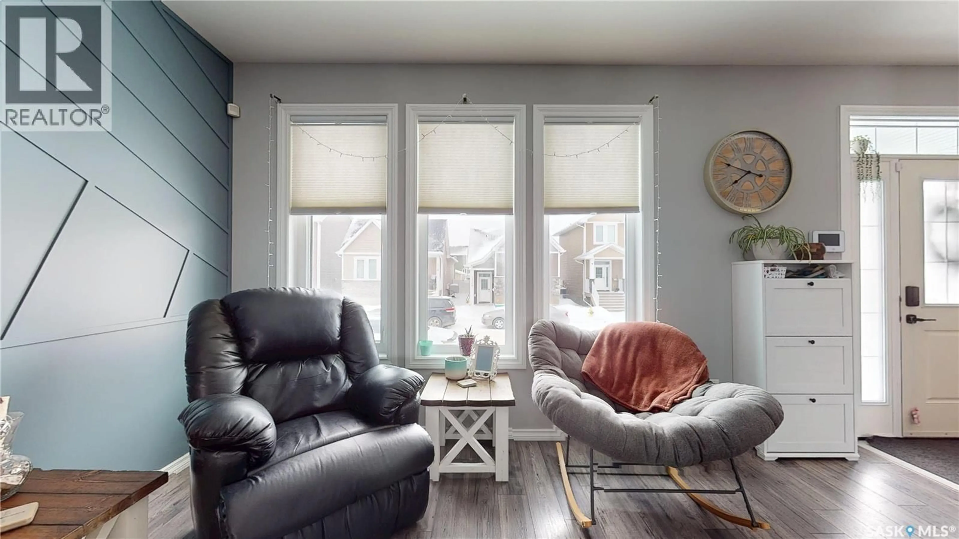 Living room with furniture, wood/laminate floor for 1117 JURASIN STREET, Regina Saskatchewan S4X0K1