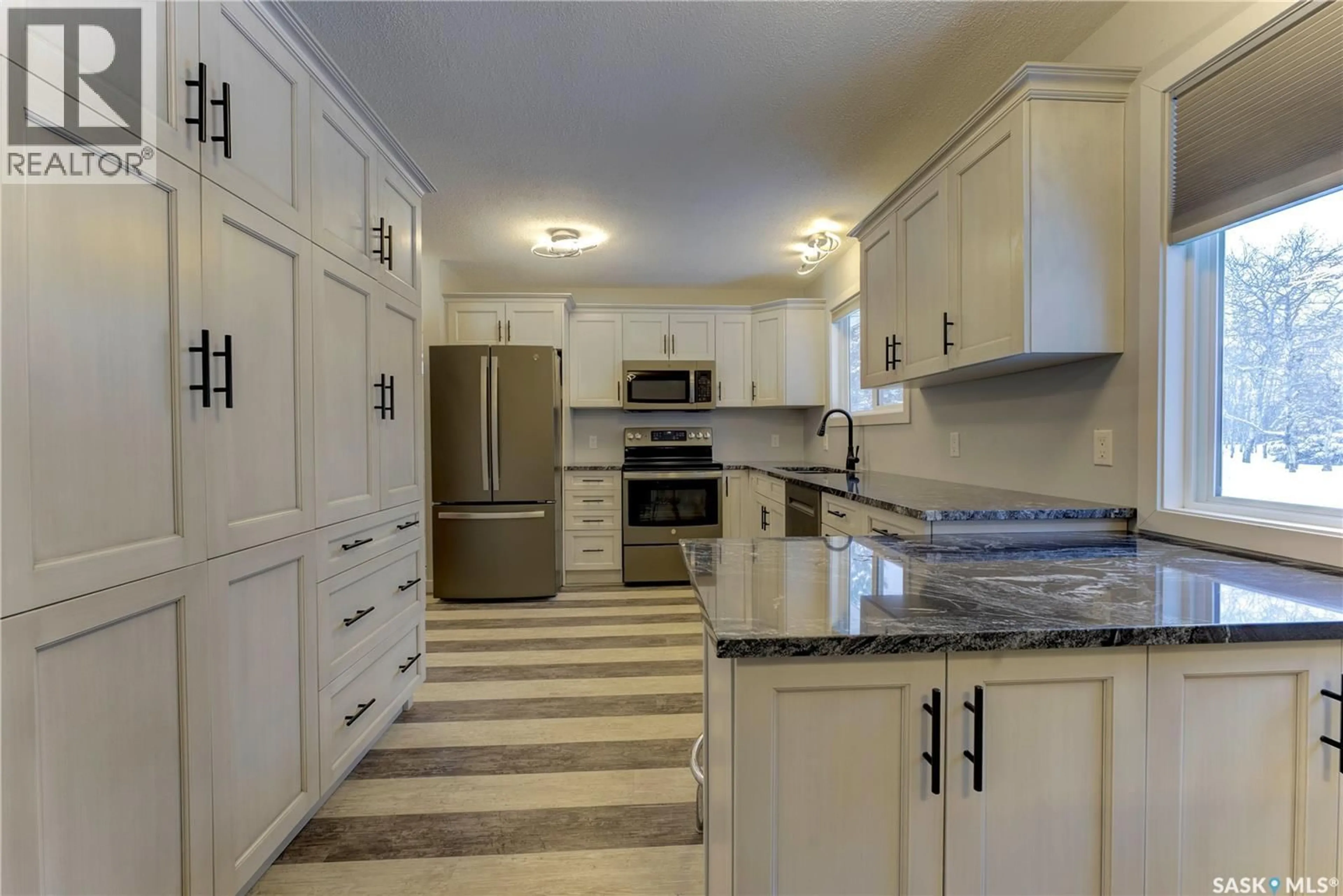 Open concept kitchen, ceramic/tile floor for 123 4TH STREET, Pierceland Saskatchewan S0M2K0