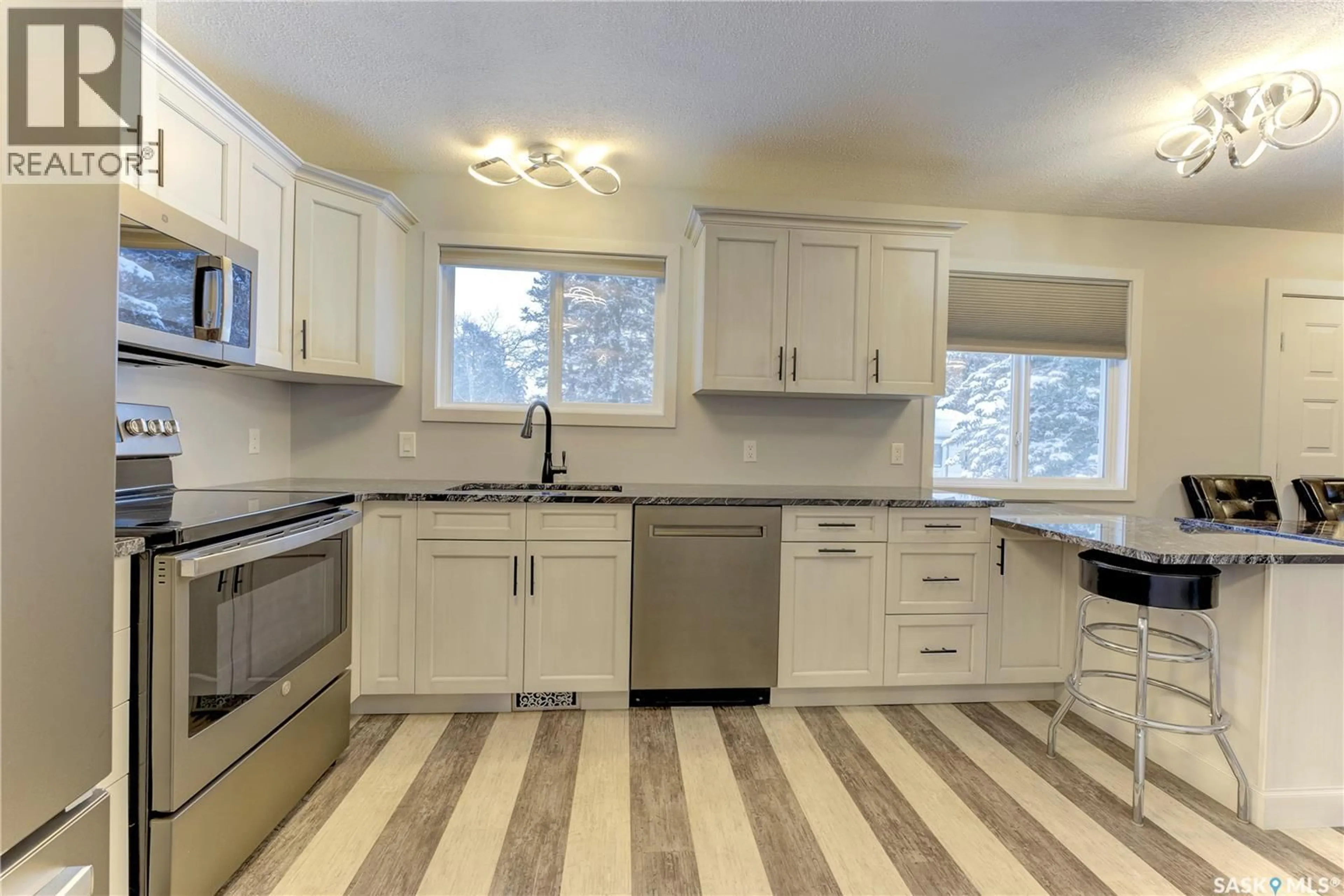 Open concept kitchen, ceramic/tile floor for 123 4TH STREET, Pierceland Saskatchewan S0M2K0