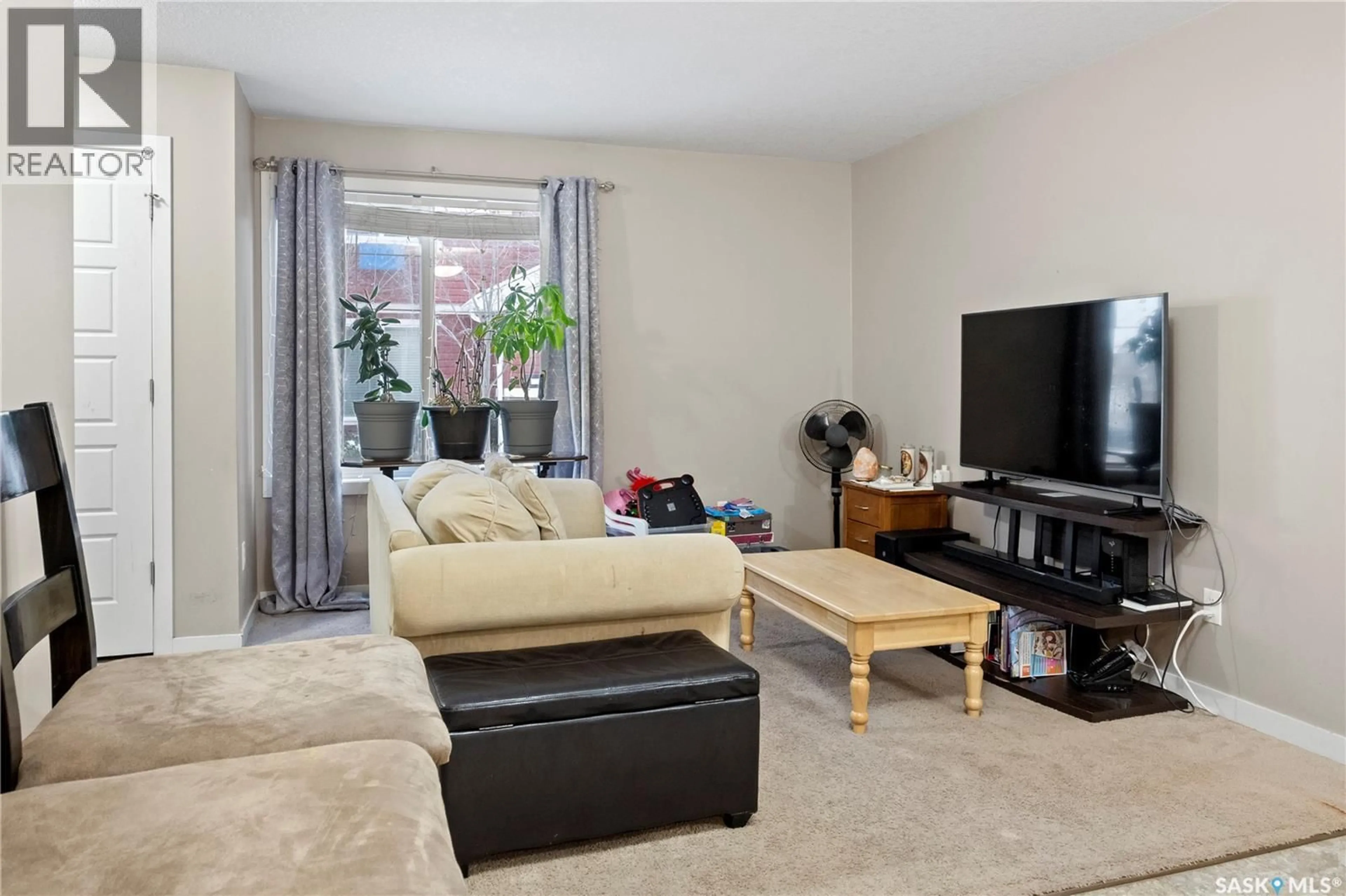Living room with furniture, unknown for 62 - 5612 GORDON ROAD, Regina Saskatchewan S4W0M1