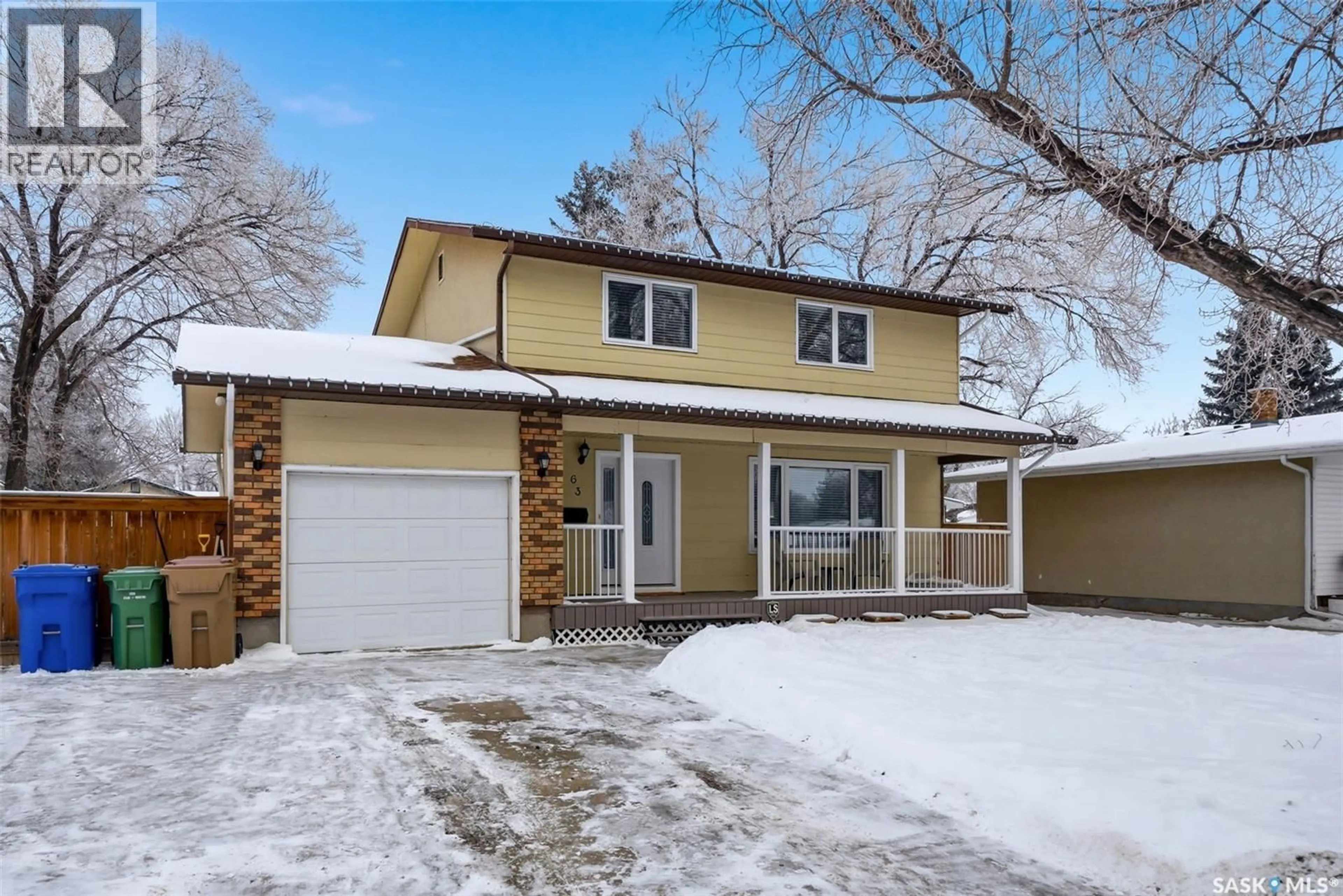 Home with vinyl exterior material, street for 63 CHAMP CRESCENT, Regina Saskatchewan S4R5B5