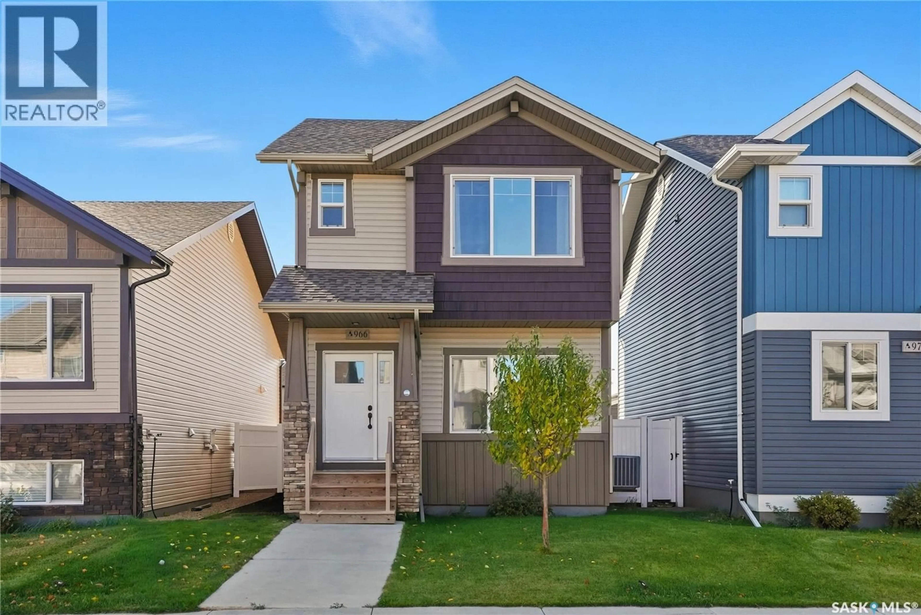 Home with vinyl exterior material, street for 966 MCFAULL MANOR, Saskatoon Saskatchewan S7V0S6