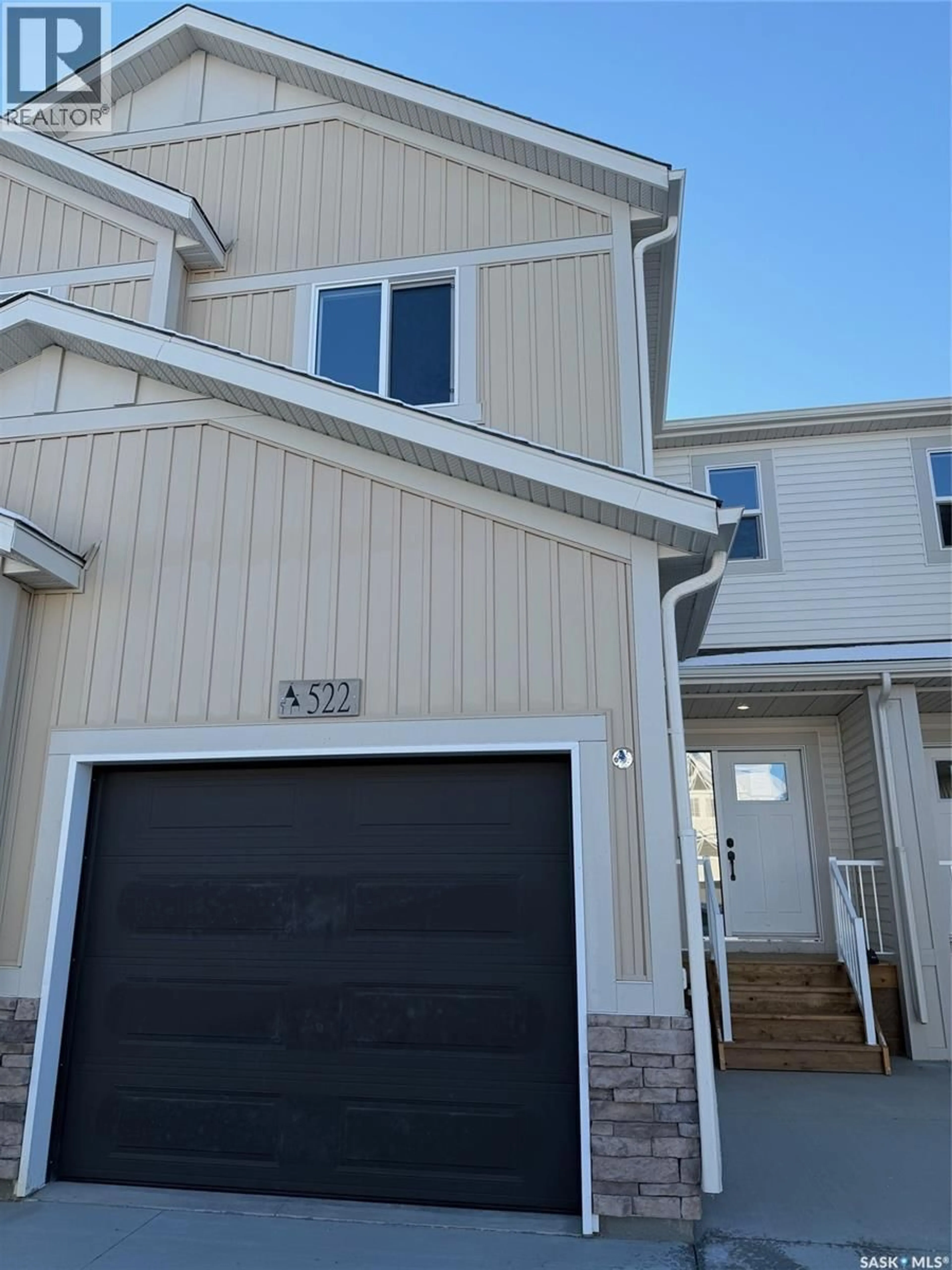 Home with vinyl exterior material, street for 522 MYLES HEIDT MANOR, Saskatoon Saskatchewan S7W0Z4
