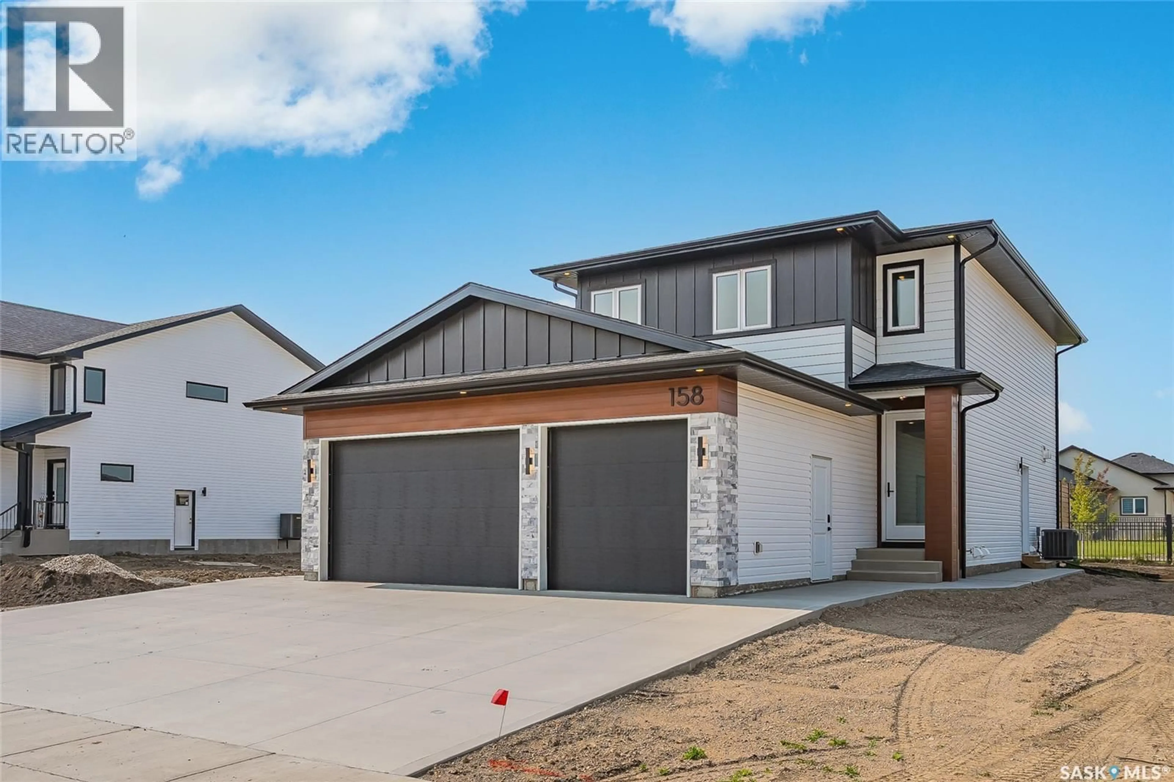 Home with brick exterior material, street for 158 HAVERSTOCK CRESCENT, Saskatoon Saskatchewan S7W1E3