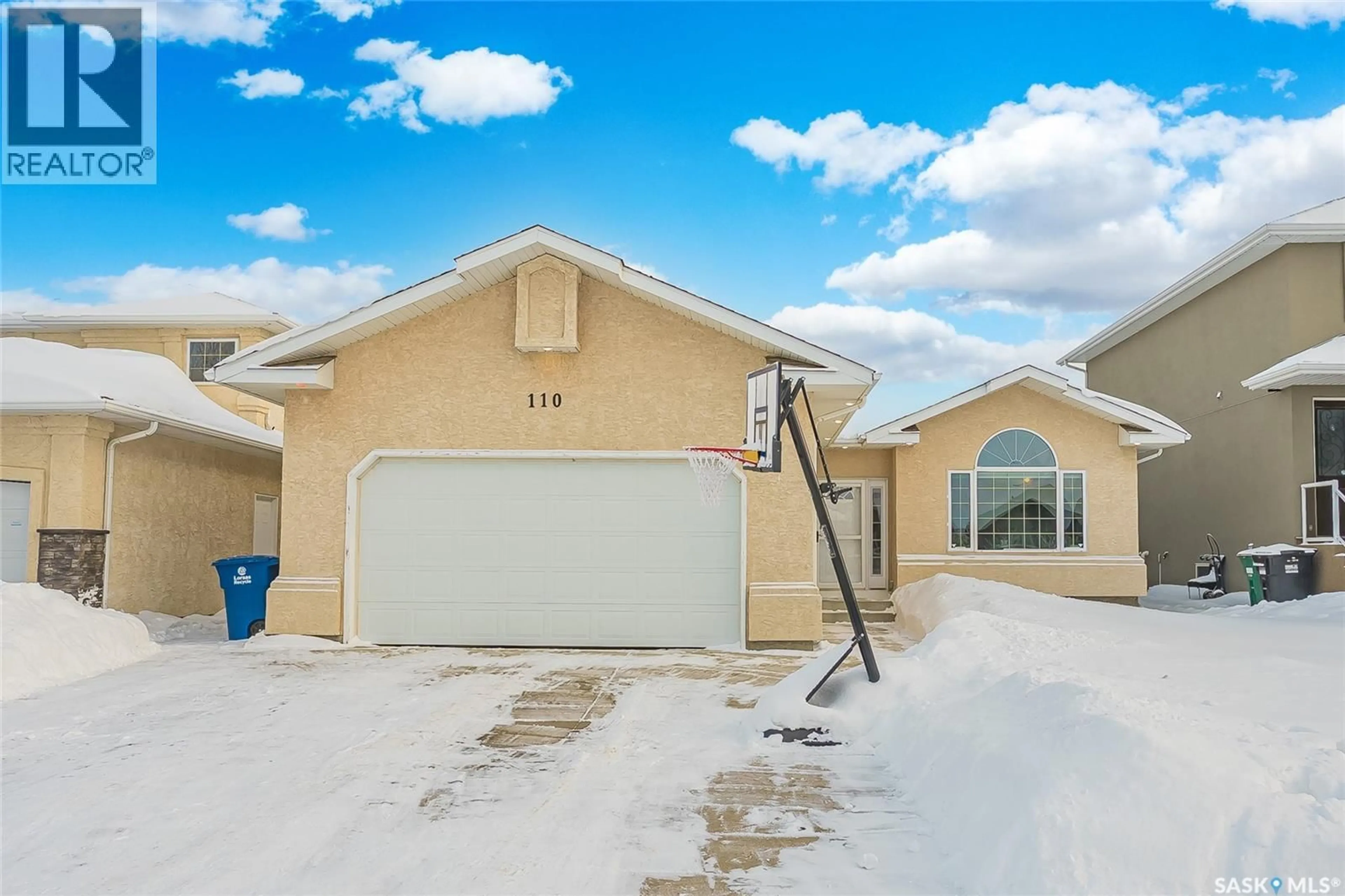 Home with vinyl exterior material, street for 110 BROOKMORE CRESCENT, Saskatoon Saskatchewan S7V1C1