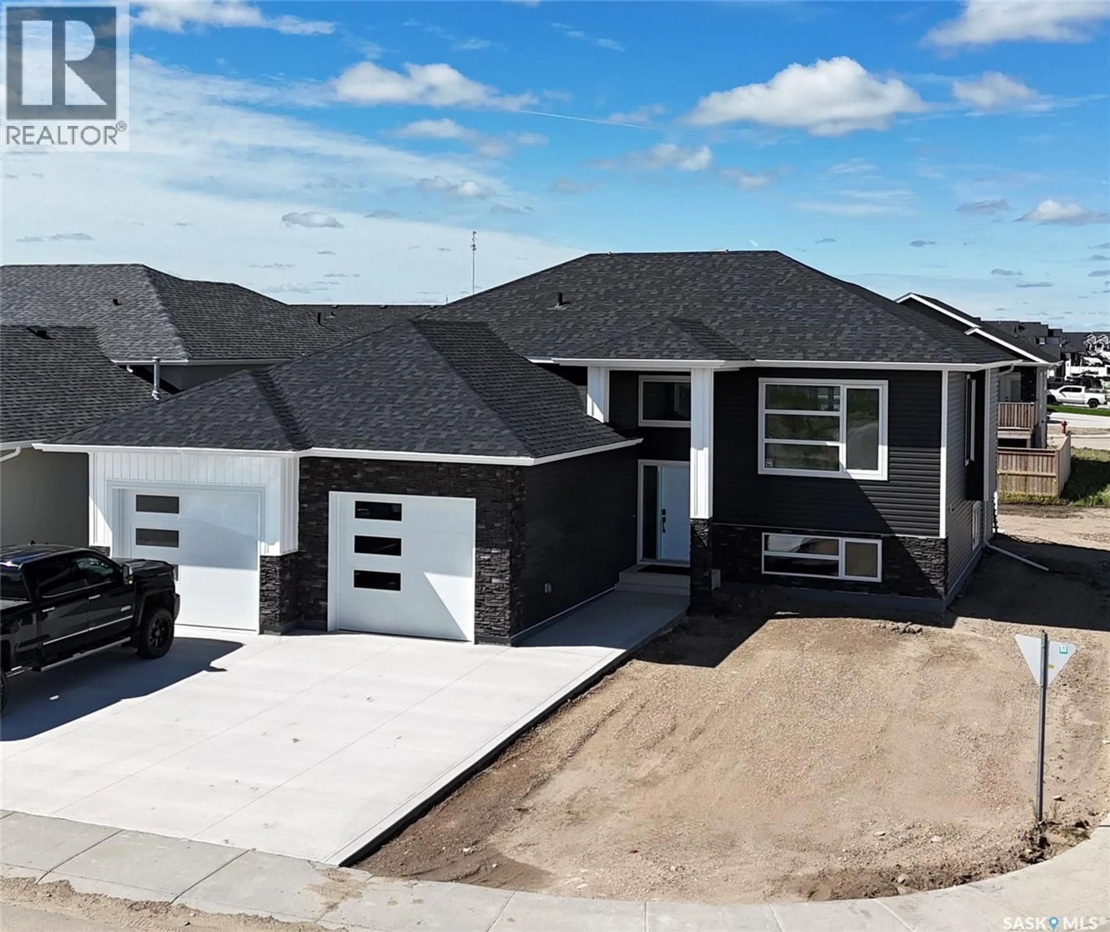 Home with vinyl exterior material, street for 806 BALLESTEROS CRESCENT, Warman Saskatchewan S0K4S4