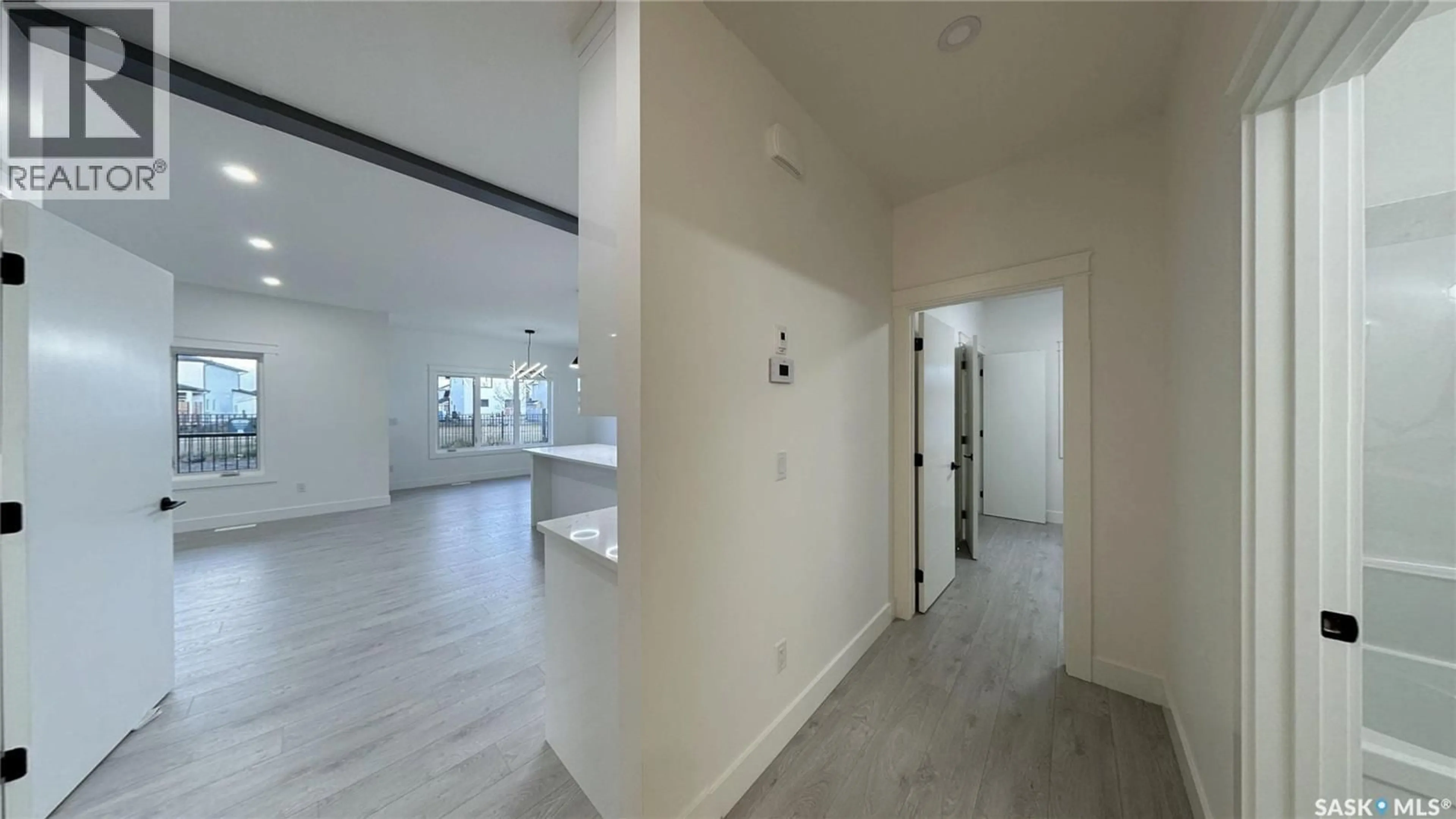 Indoor foyer for 147 WOOLF BEND, Saskatoon Saskatchewan S7W0L6