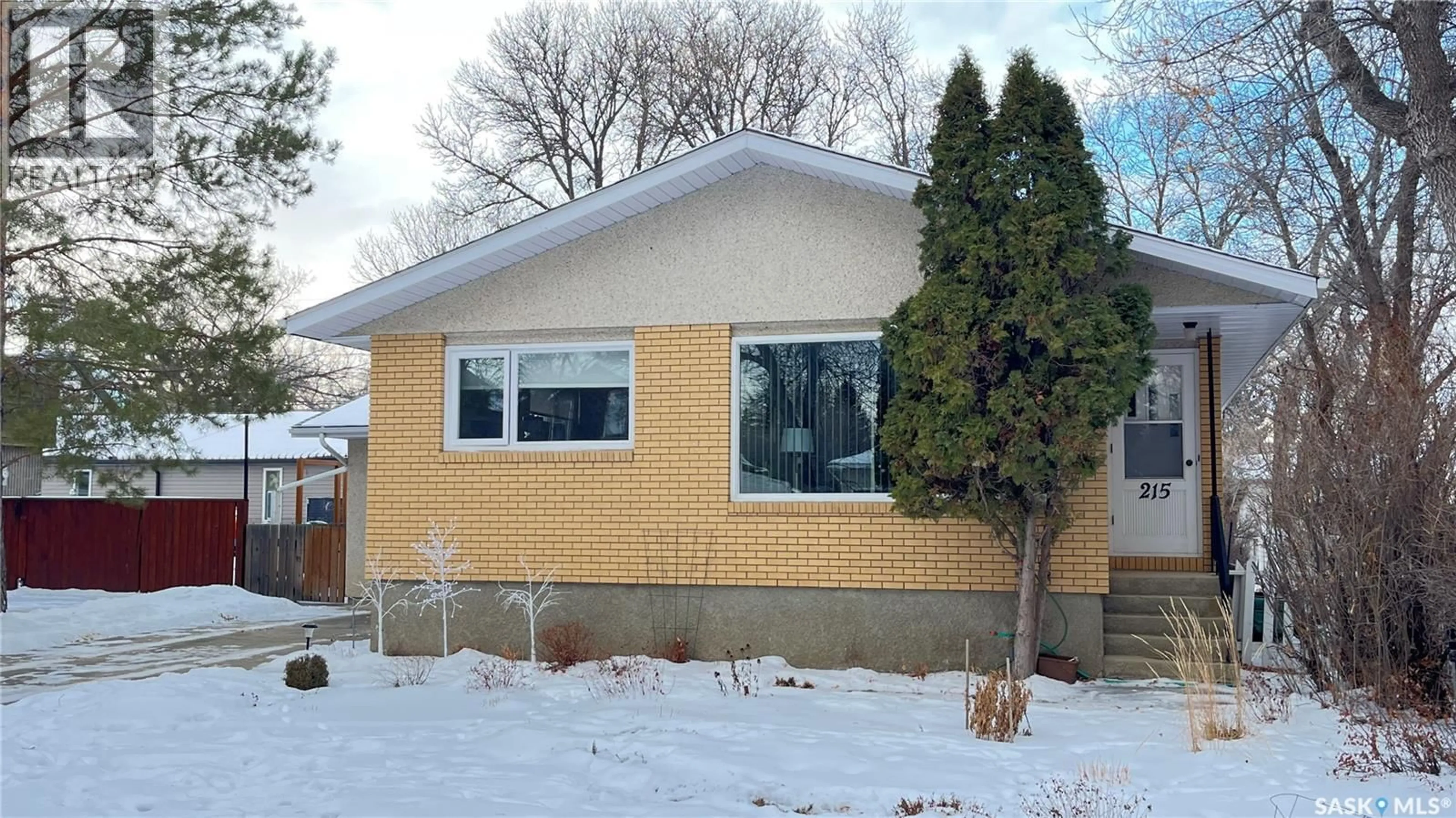 Home with brick exterior material, street for 215 MARSH STREET, Maple Creek Saskatchewan S0N1N0