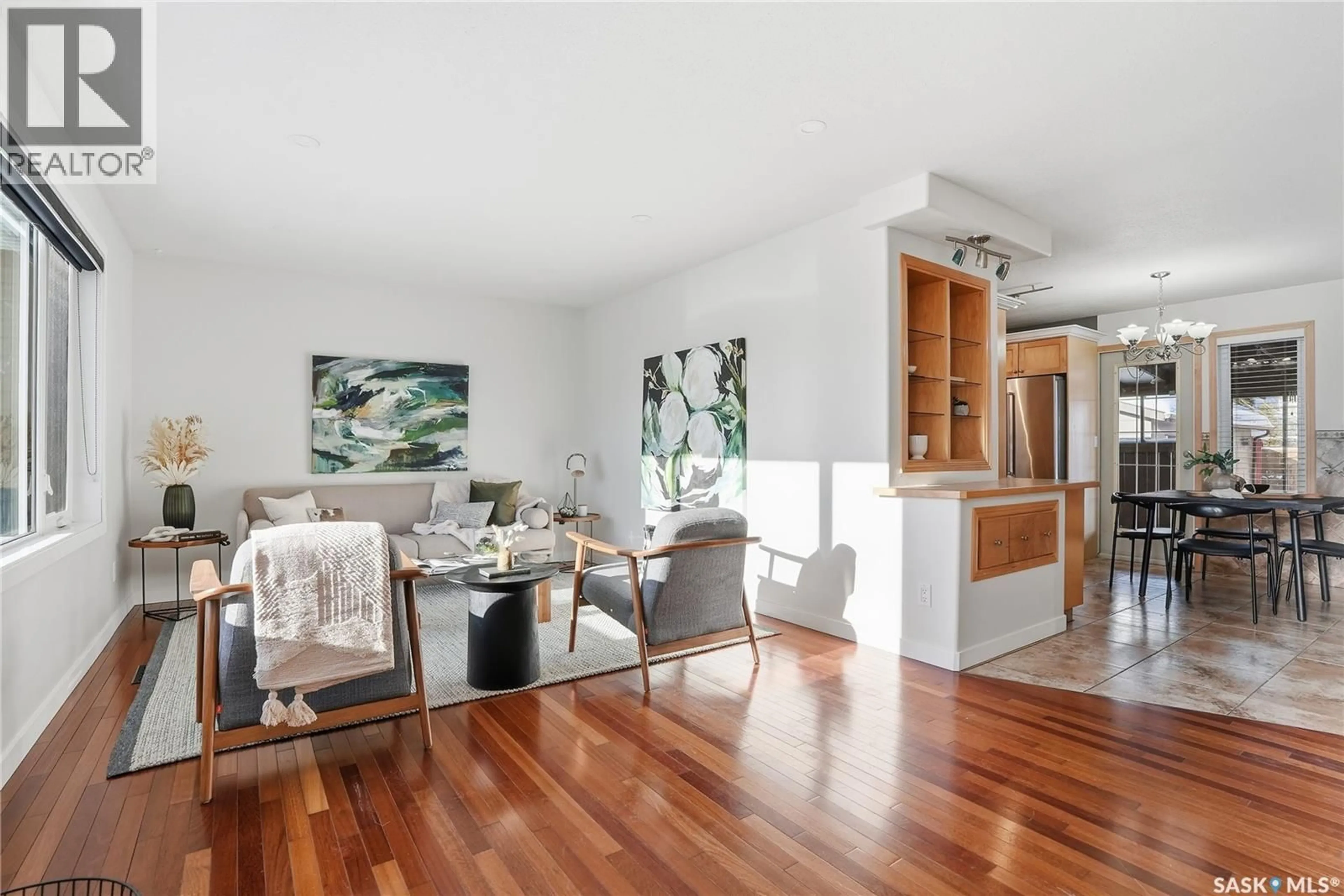 Dining room, wood/laminate floor for 218 WEDGE ROAD, Saskatoon Saskatchewan S7L6E9