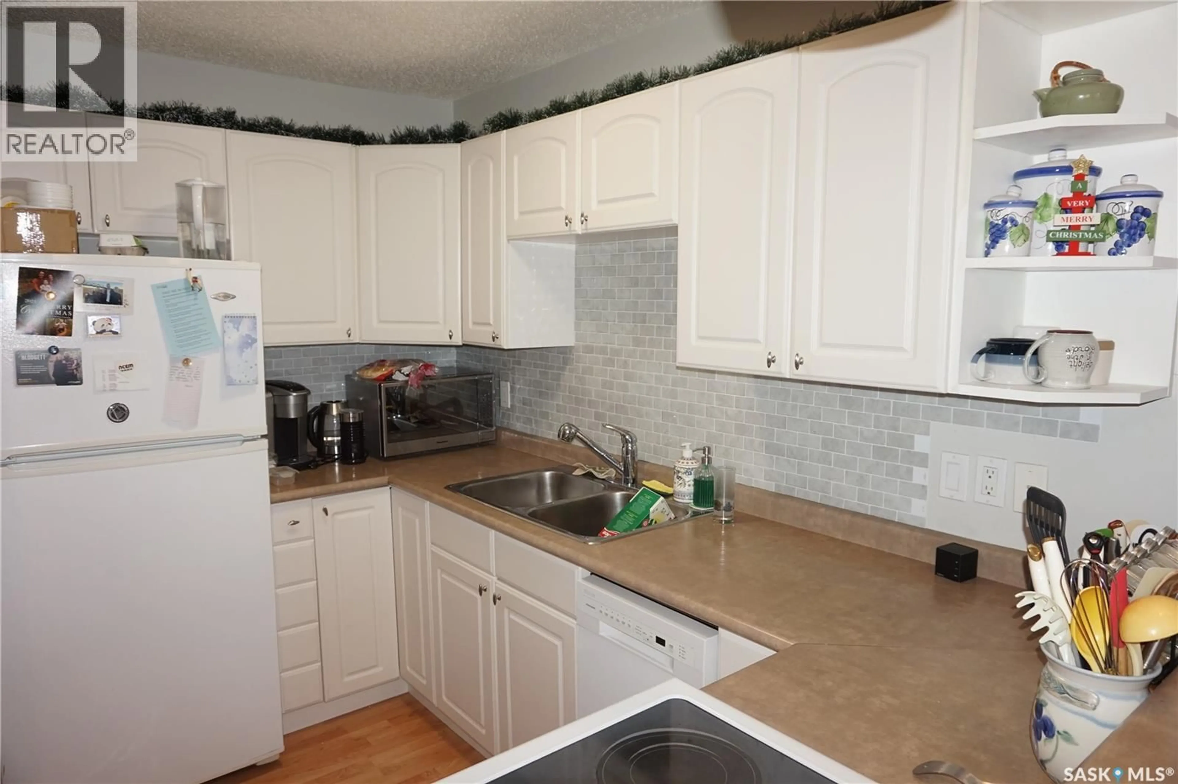Standard kitchen, unknown for 303 - 2315 MCINTYRE STREET, Regina Saskatchewan S4P3Y8