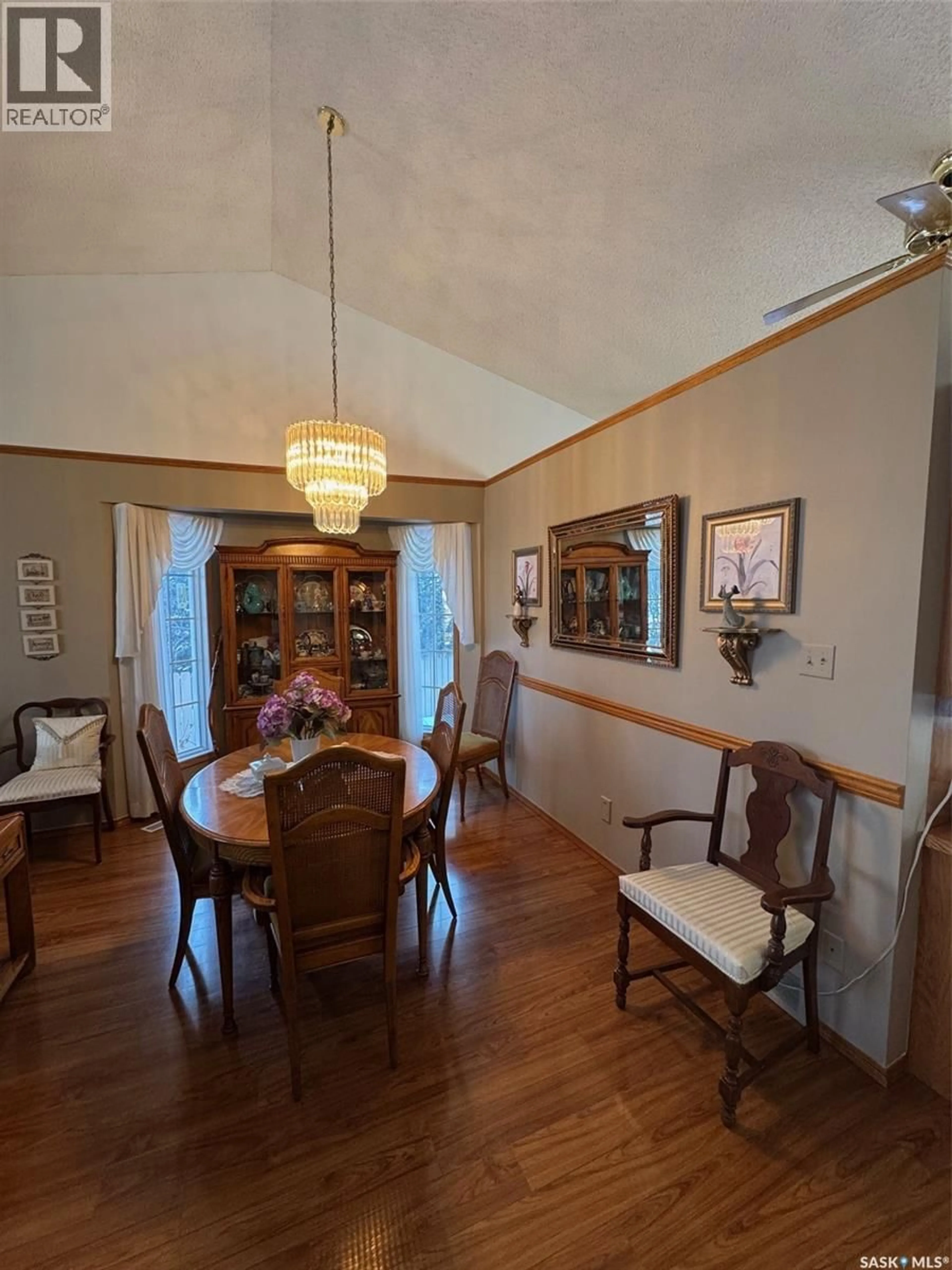 Dining room, wood/laminate floor for 2506 EAGLE RISE, North Battleford Saskatchewan S9A3Z1