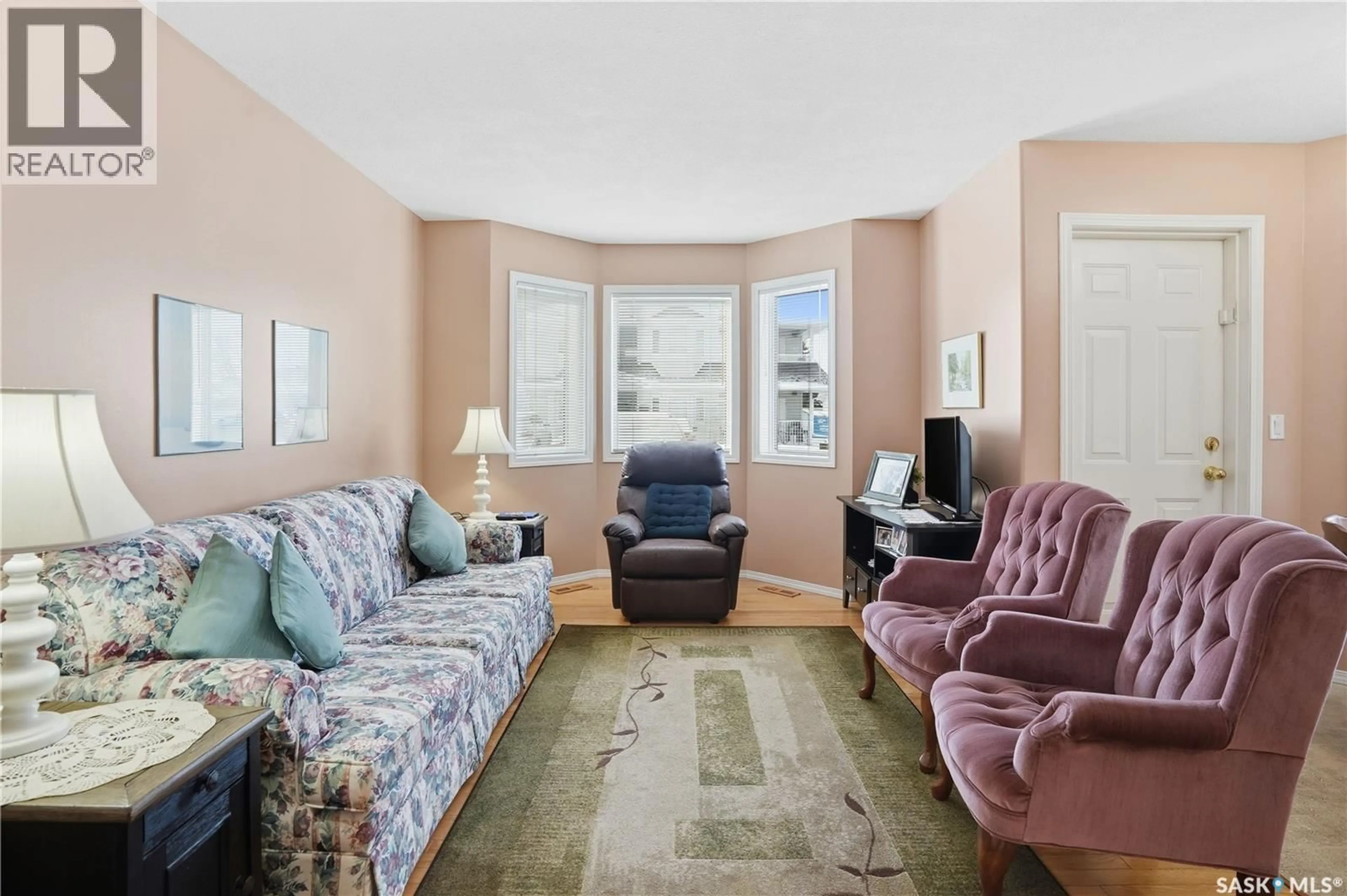 Living room with furniture, carpet floor for 3281 WOODHAMS DRIVE, Regina Saskatchewan S4V3A2