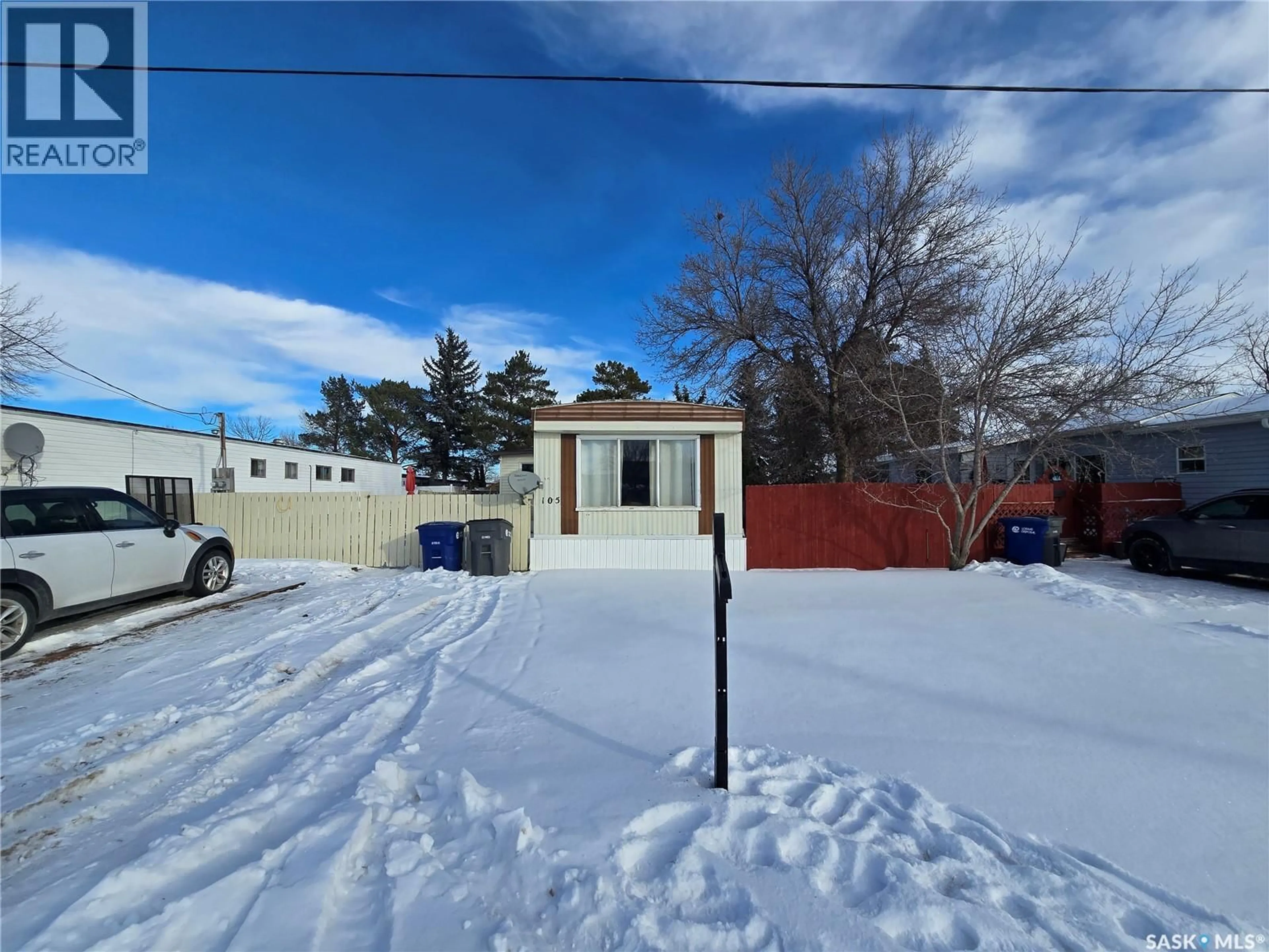 A pic from outside/outdoor area/front of a property/back of a property/a pic from drone, street for 105 LARCH STREET, Caronport Saskatchewan S0H0S0