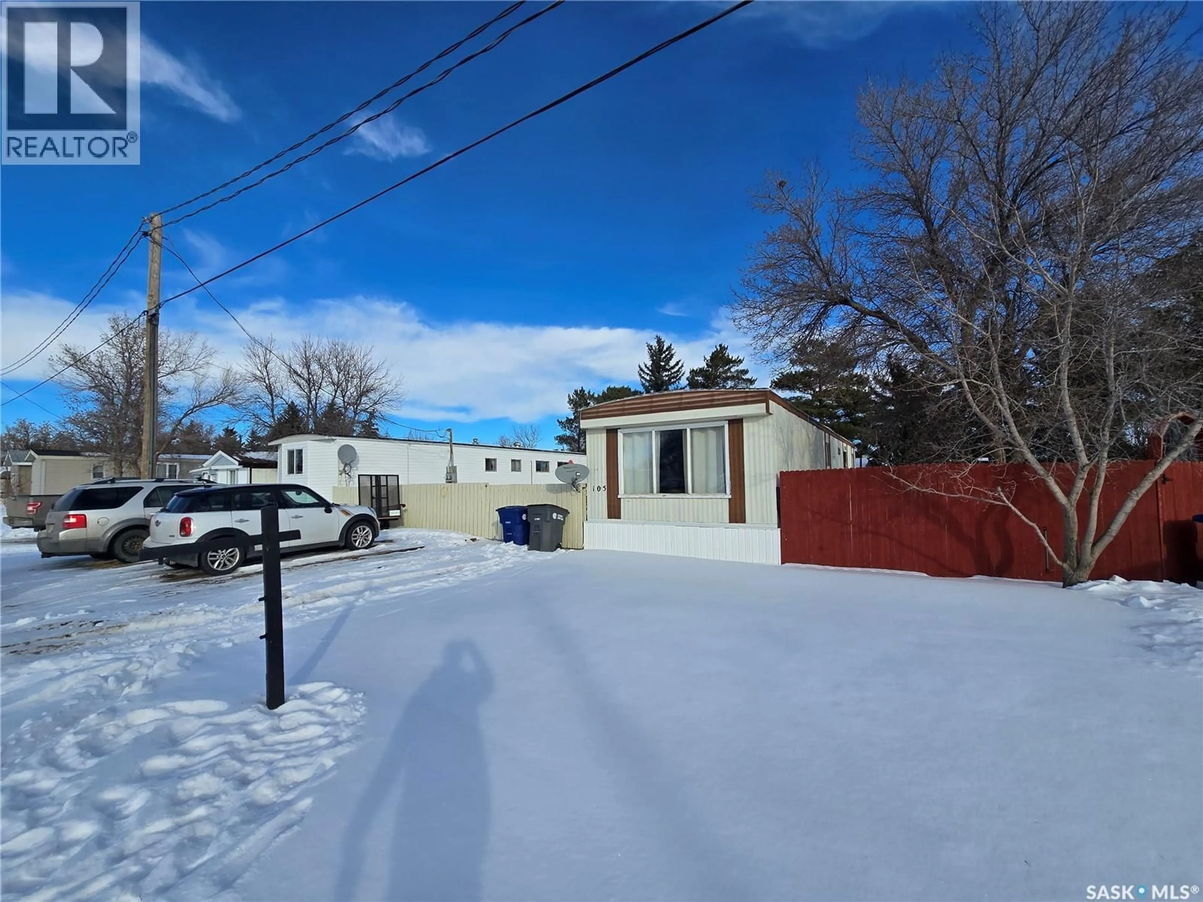 A pic from outside/outdoor area/front of a property/back of a property/a pic from drone, street for 105 LARCH STREET, Caronport Saskatchewan S0H0S0