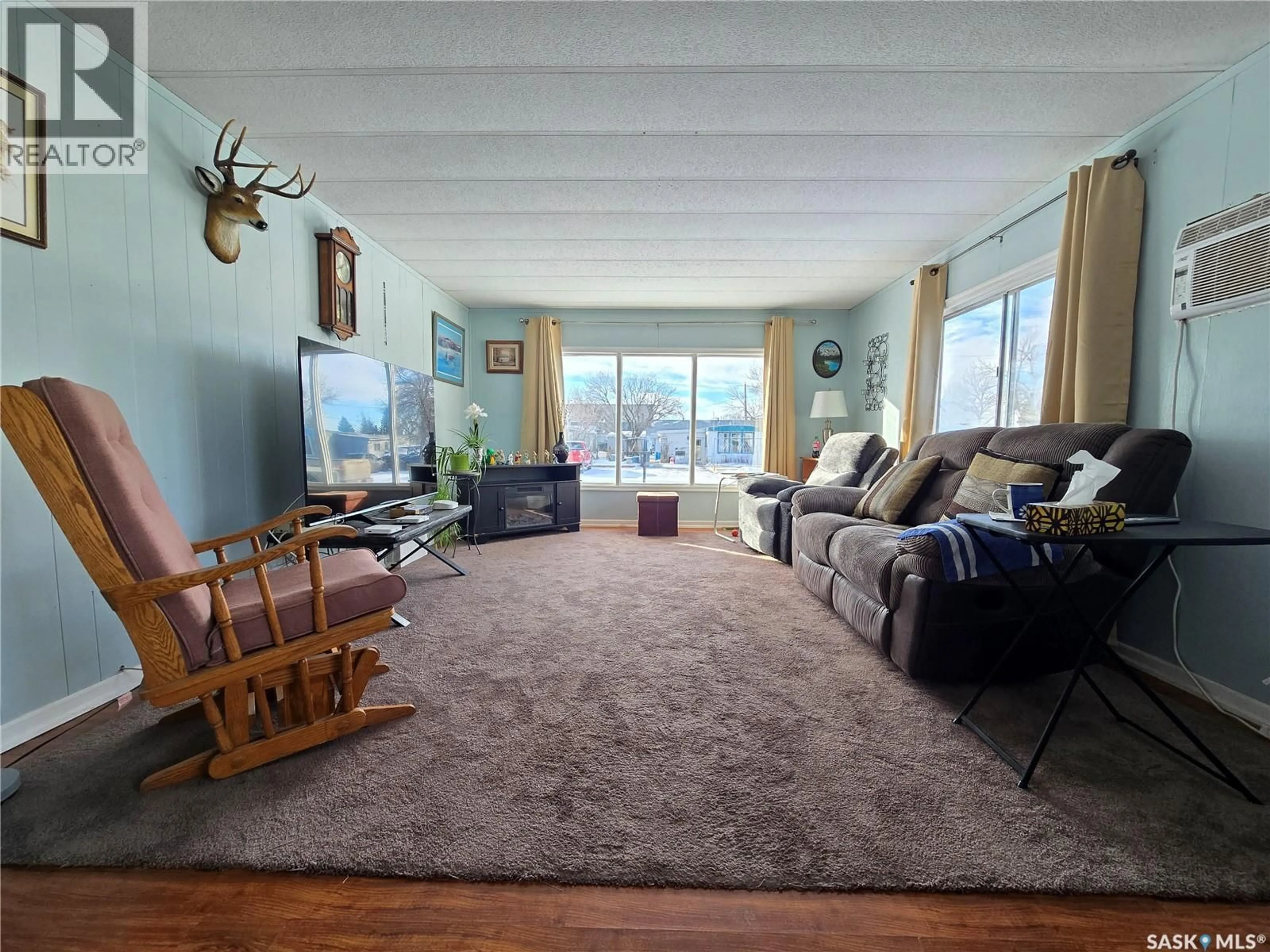 Living room with furniture, unknown for 105 LARCH STREET, Caronport Saskatchewan S0H0S0