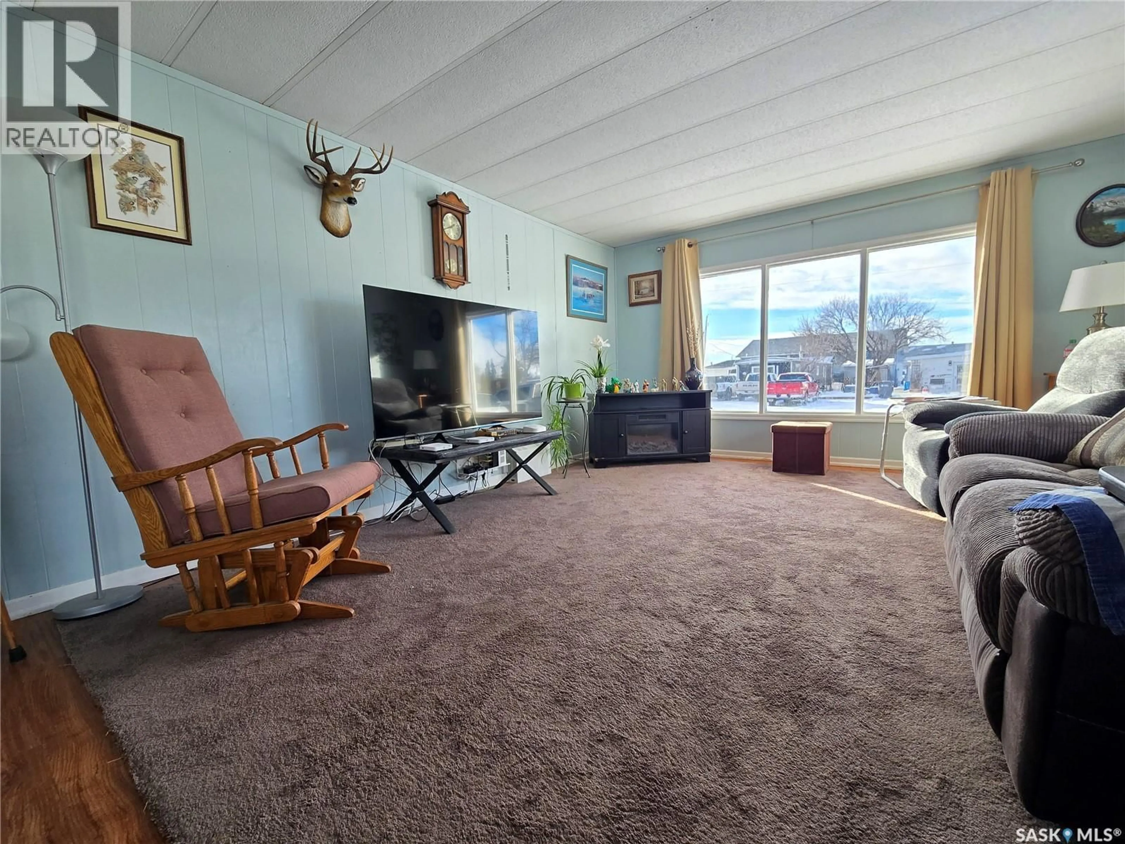 Living room with furniture, unknown for 105 LARCH STREET, Caronport Saskatchewan S0H0S0