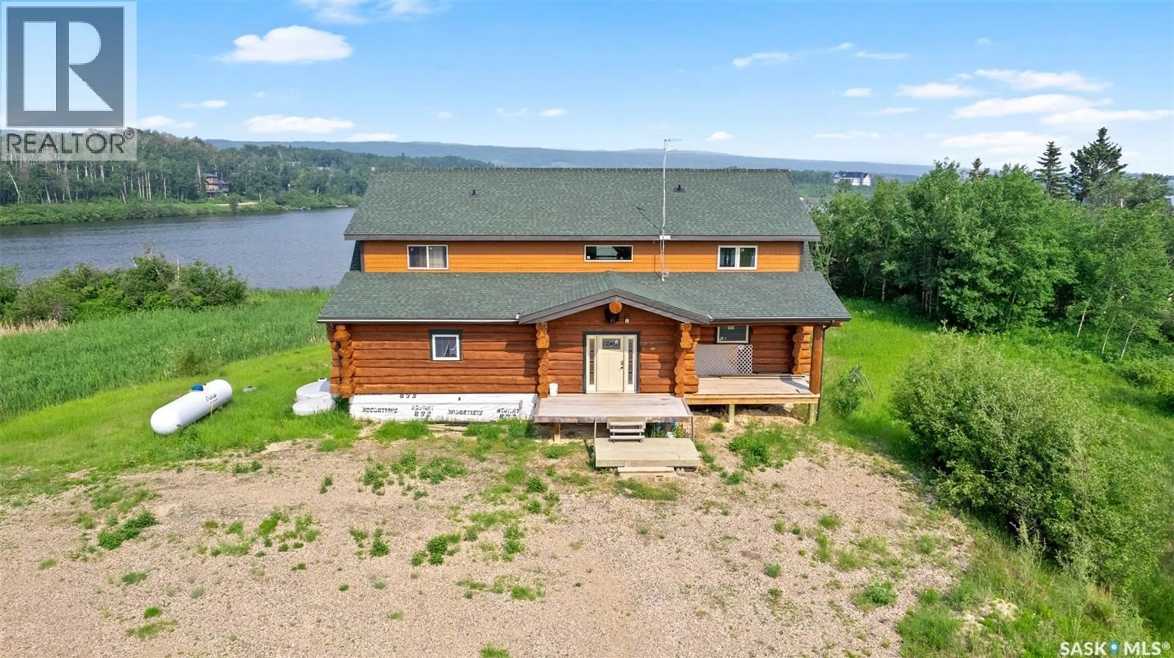 A pic from outside/outdoor area/front of a property/back of a property/a pic from drone, water/lake/river/ocean view for MARTINS LAKE SCENIC WATERFRONT LOG HOME, Leask Rm No. 464 Saskatchewan S0J1M0