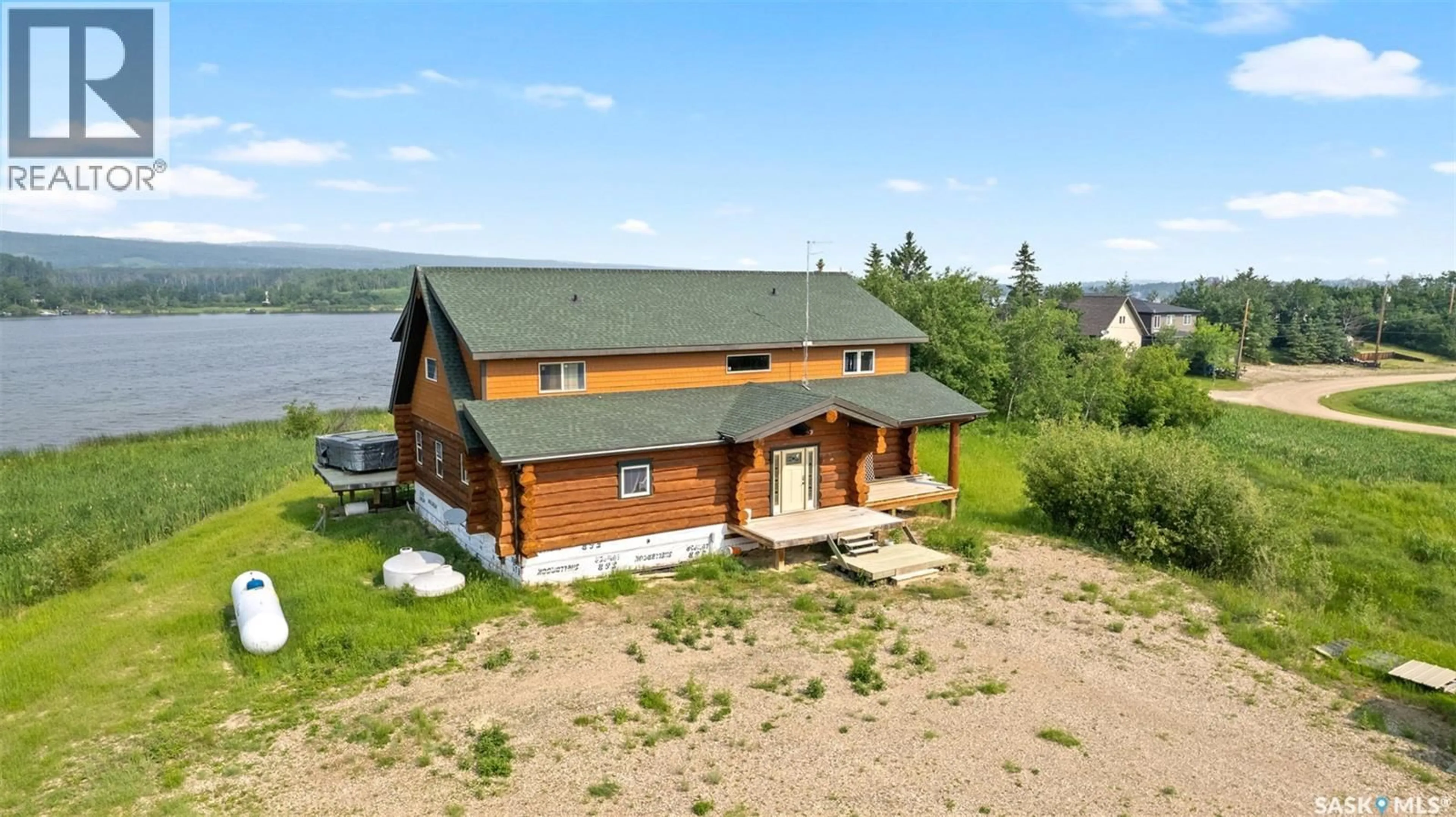 A pic from outside/outdoor area/front of a property/back of a property/a pic from drone, building for MARTINS LAKE SCENIC WATERFRONT LOG HOME, Leask Rm No. 464 Saskatchewan S0J1M0