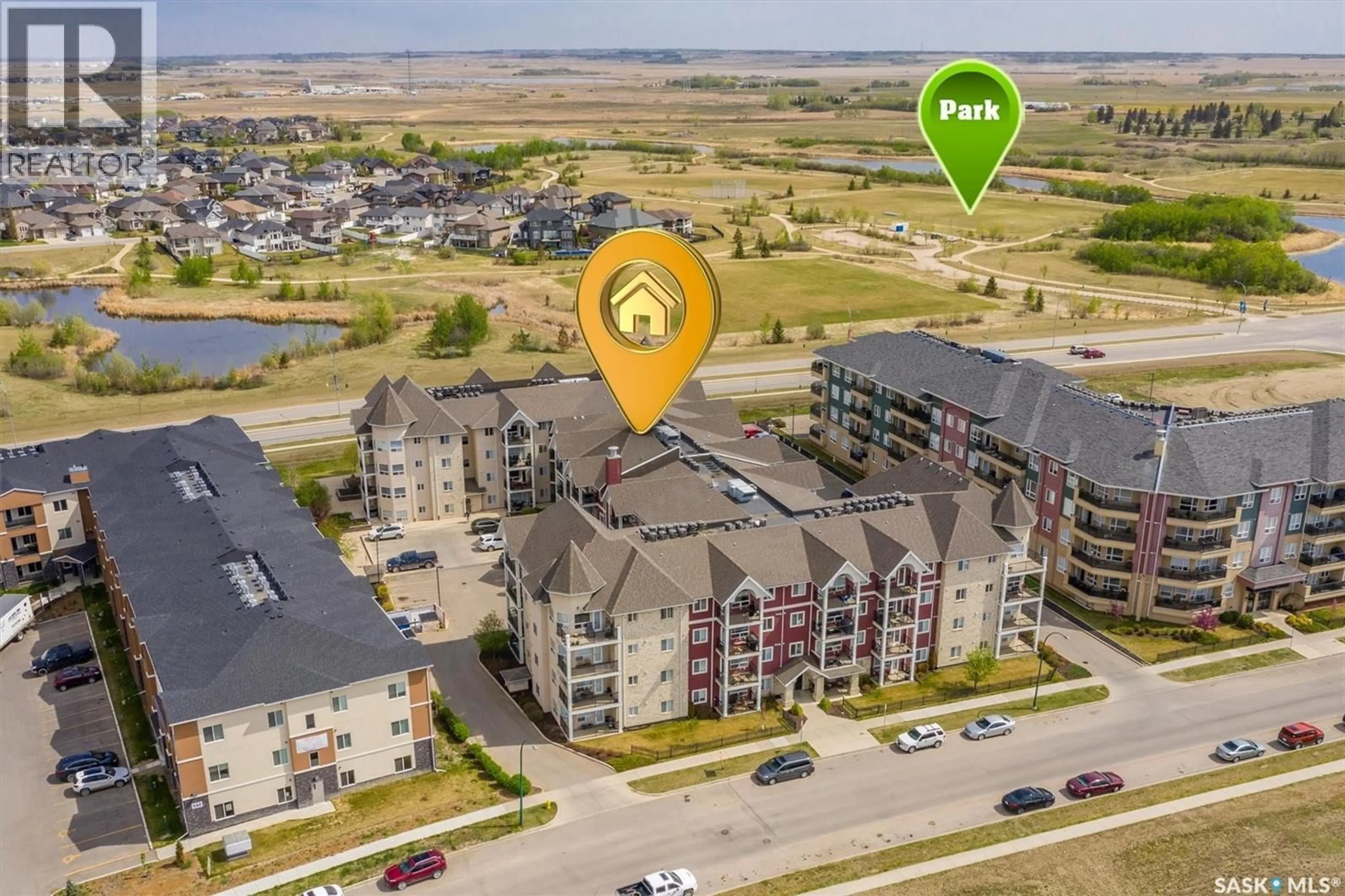 A pic from outside/outdoor area/front of a property/back of a property/a pic from drone, unknown for 118 150 PAWLYCHENKO LANE, Saskatoon Saskatchewan S7V0B4