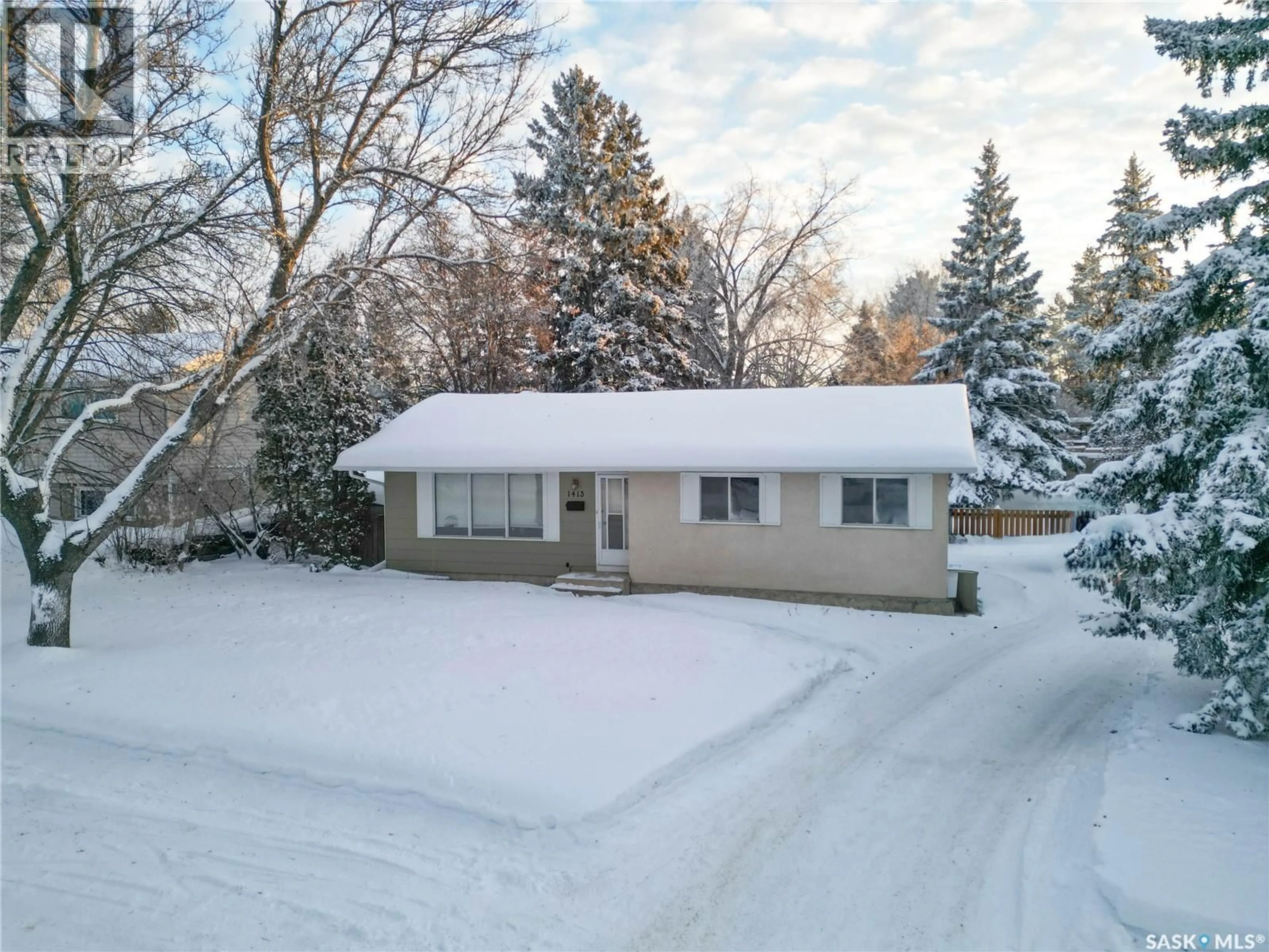 A pic from outside/outdoor area/front of a property/back of a property/a pic from drone, street for 1413 HOLMES ROAD, Prince Albert Saskatchewan S6V6C5