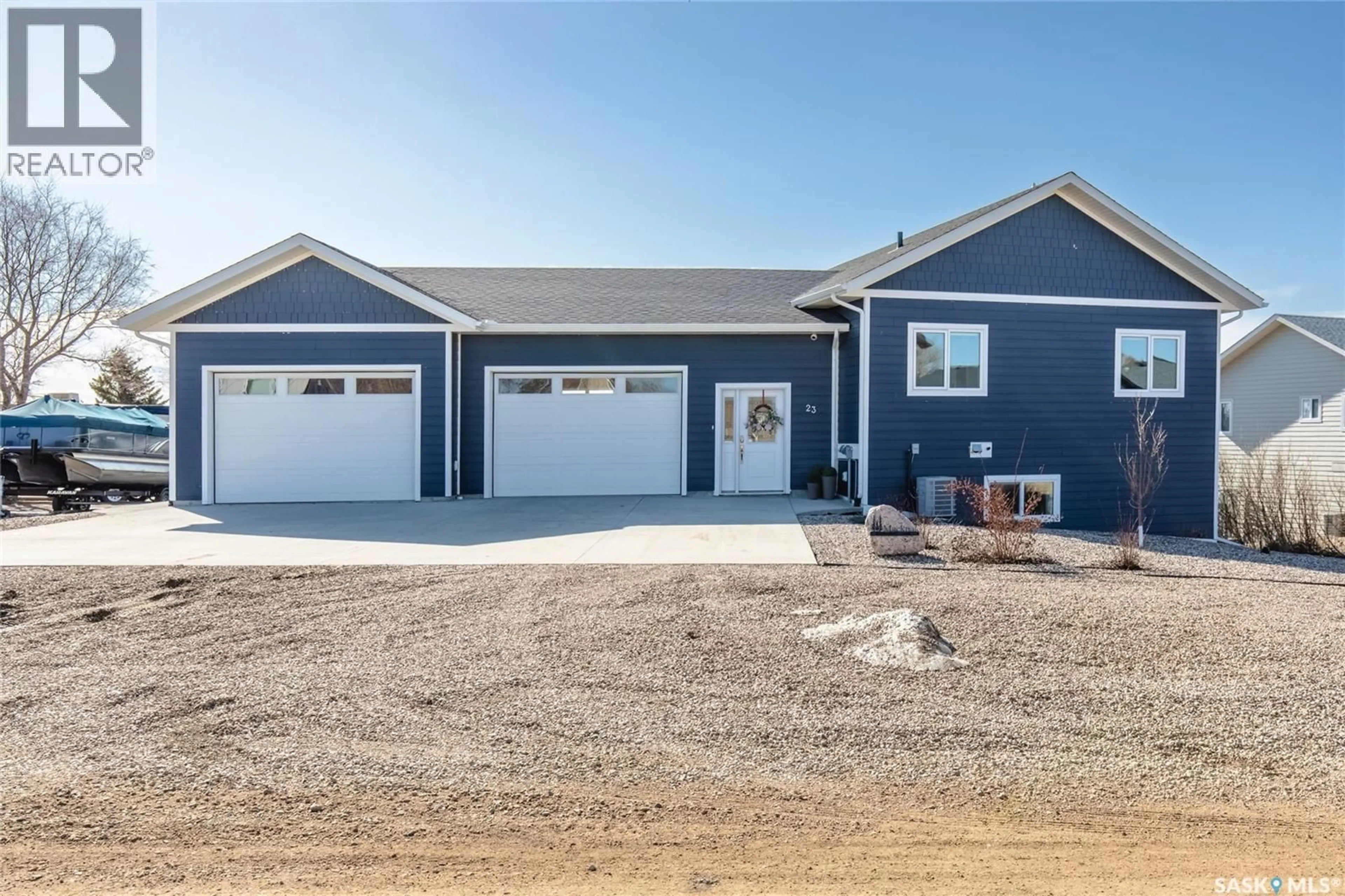 Home with vinyl exterior material, street for 23 GRACE LANE, Coteau Rm No. 255 Saskatchewan S0L2E0