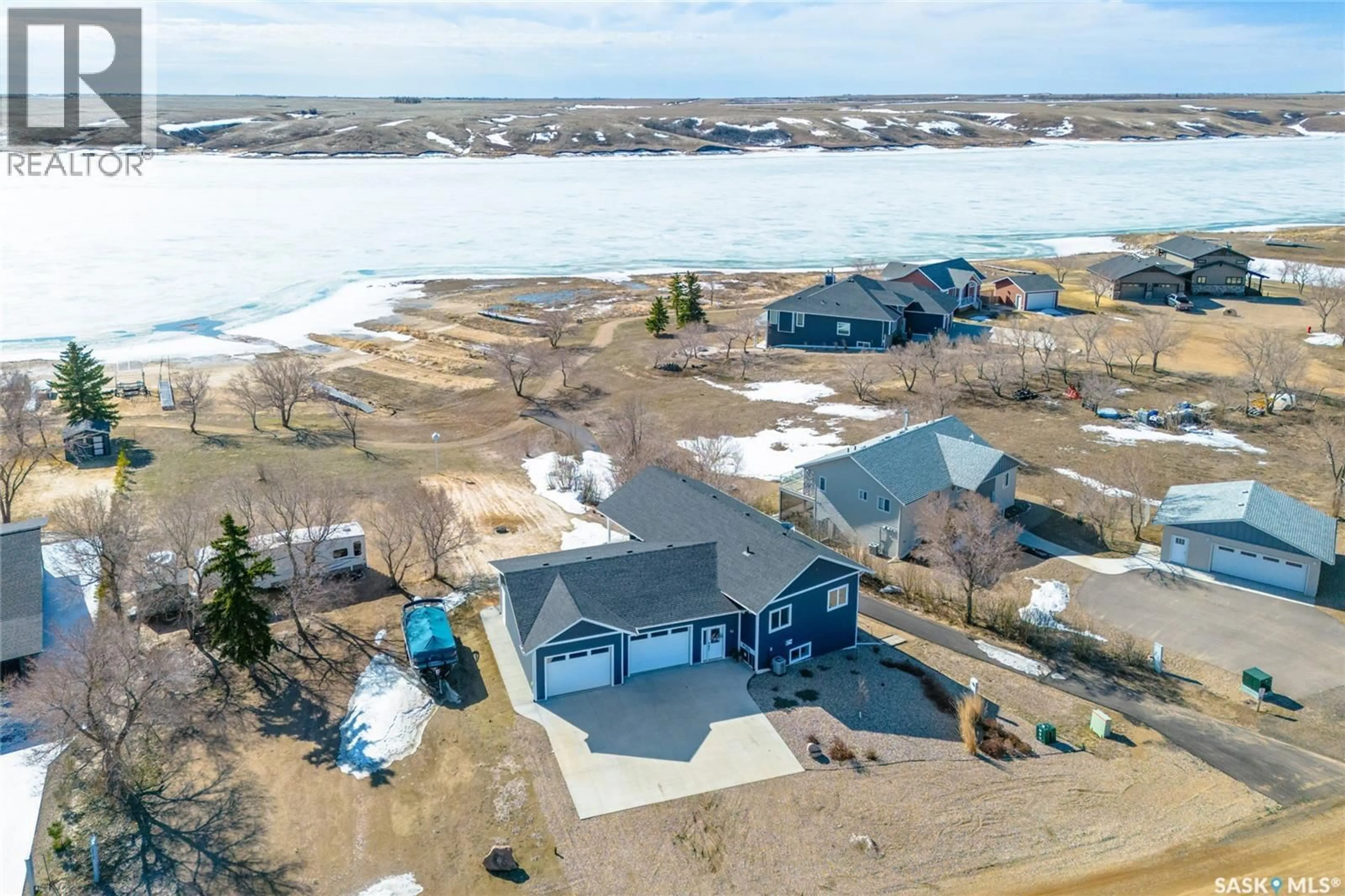 A pic from outside/outdoor area/front of a property/back of a property/a pic from drone, water/lake/river/ocean view for 23 GRACE LANE, Coteau Rm No. 255 Saskatchewan S0L2E0