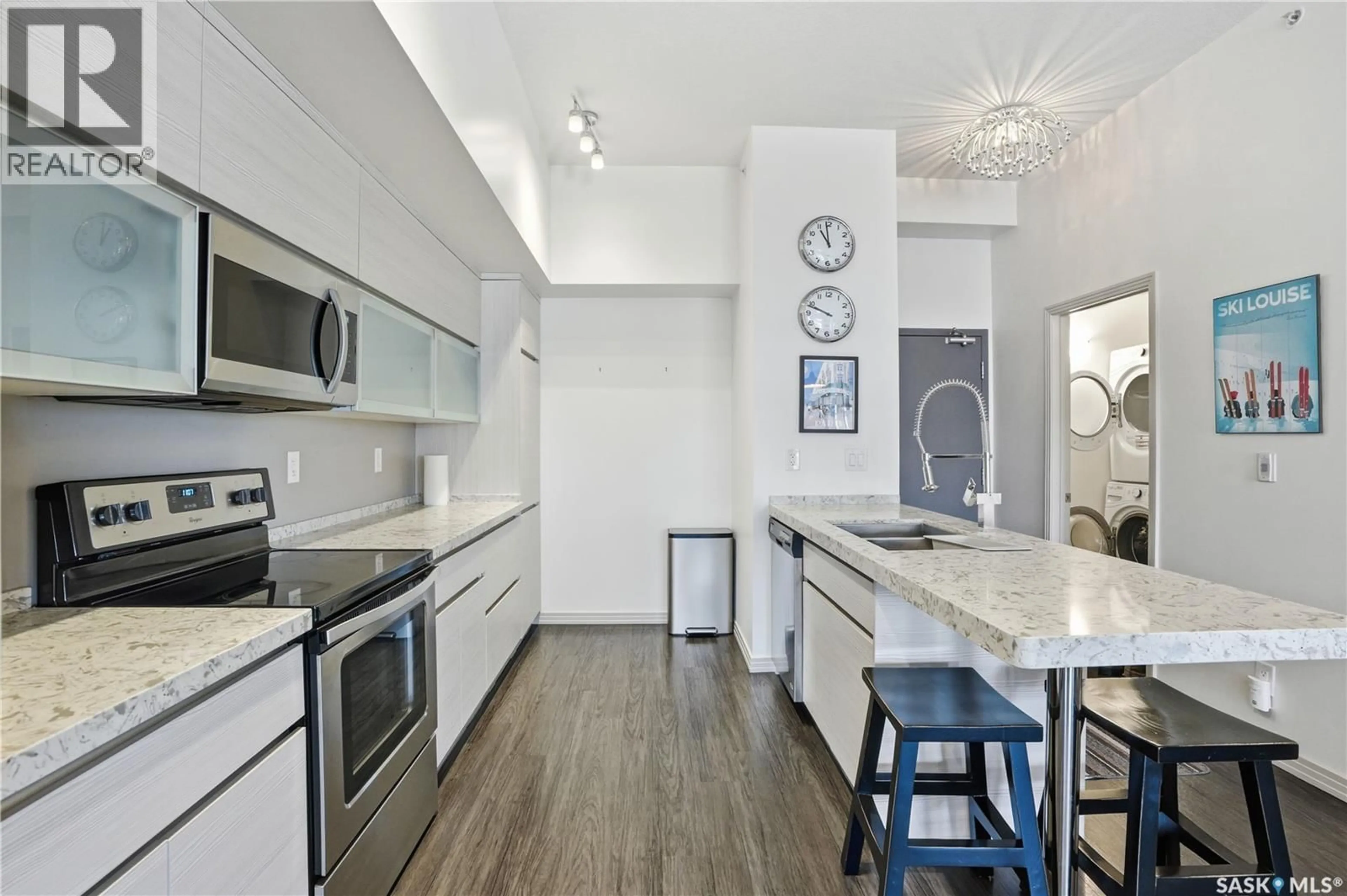 Open concept kitchen, ceramic/tile floor for 322 223 EVERGREEN SQUARE, Saskatoon Saskatchewan S7W0W2