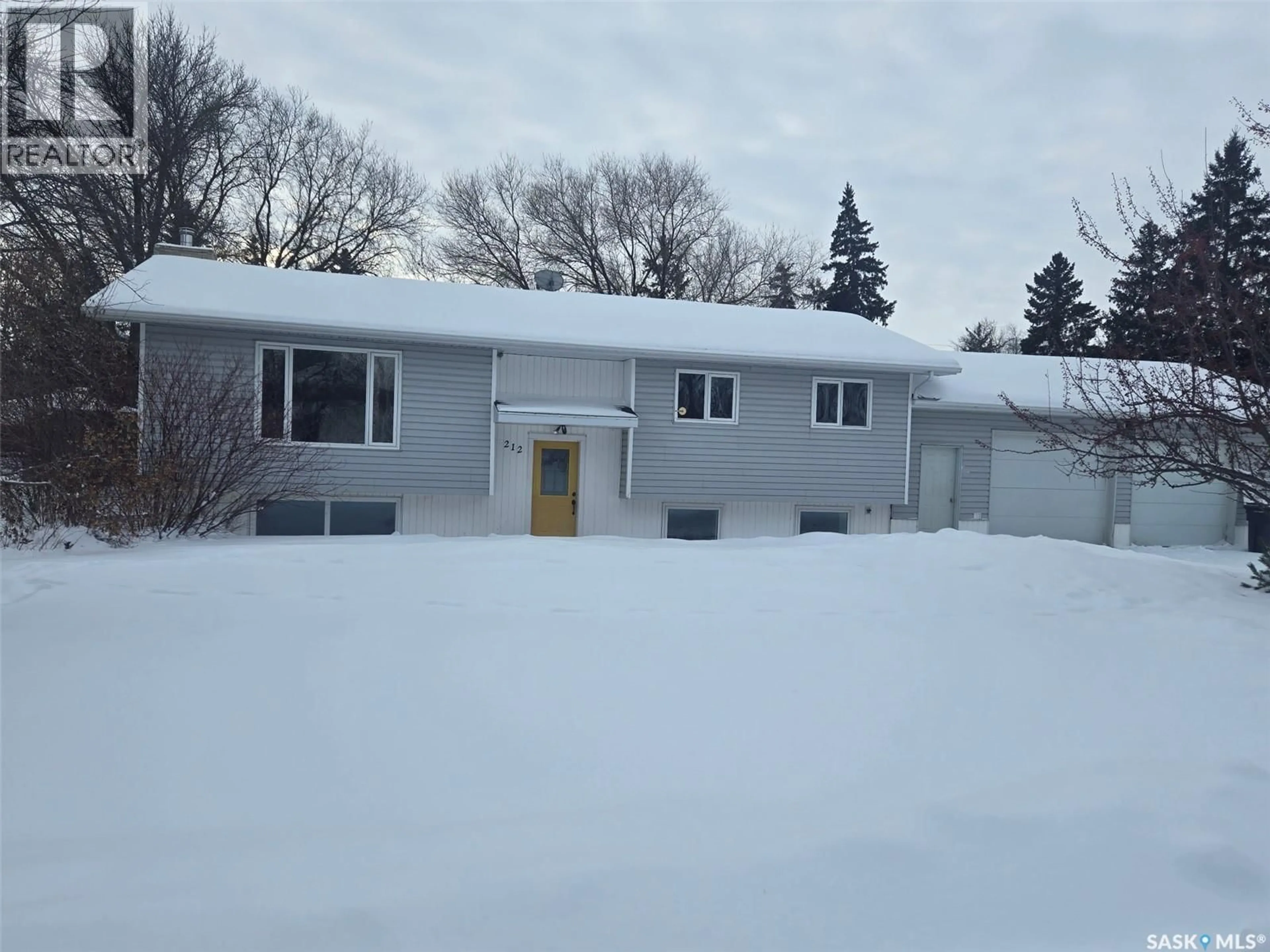 Home with vinyl exterior material, street for 212 4TH AVENUE, Nokomis Saskatchewan S0G3R0