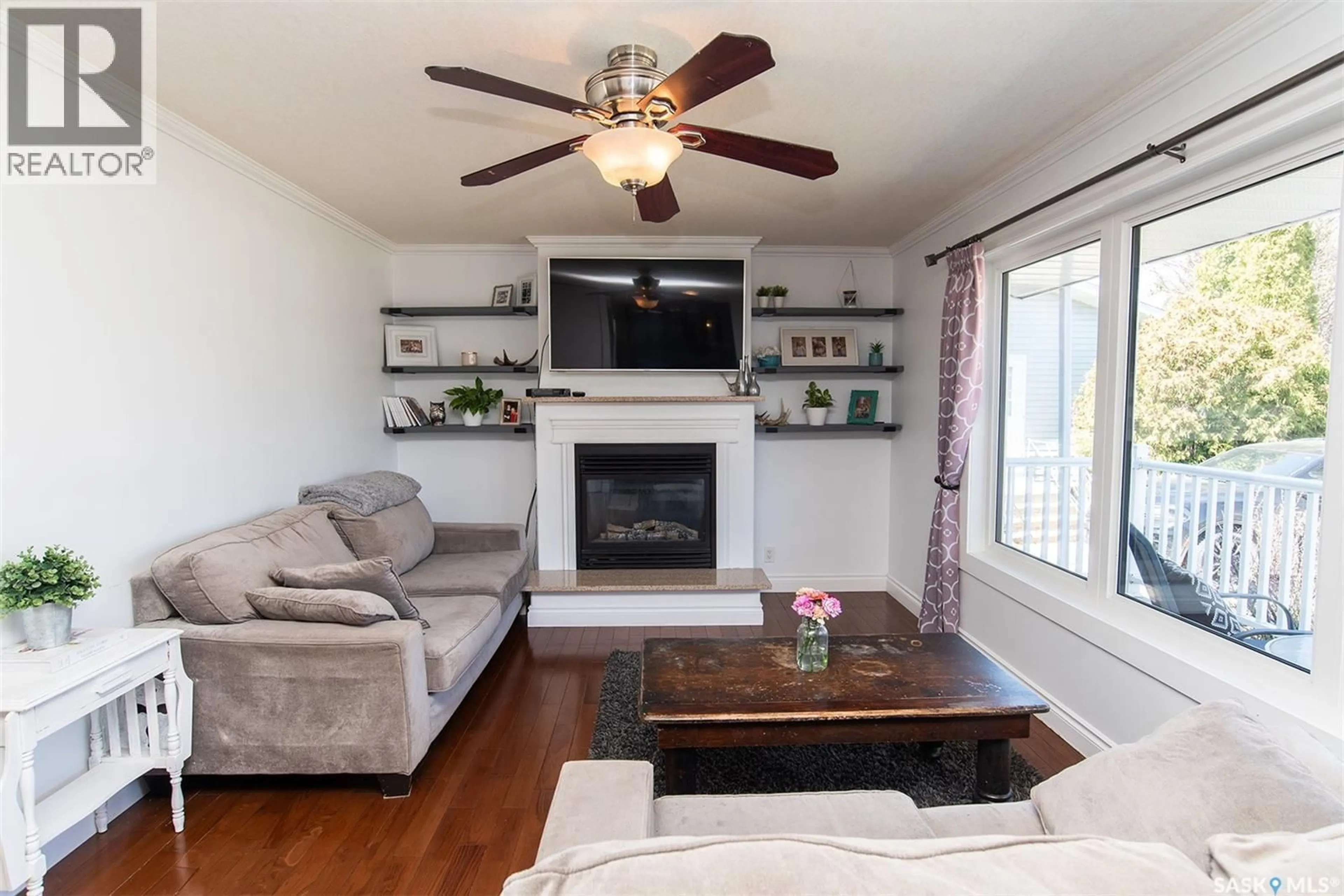 Living room with furniture, wood/laminate floor for 207 BROOKDALE PLACE, Wynyard Saskatchewan S0A4T0