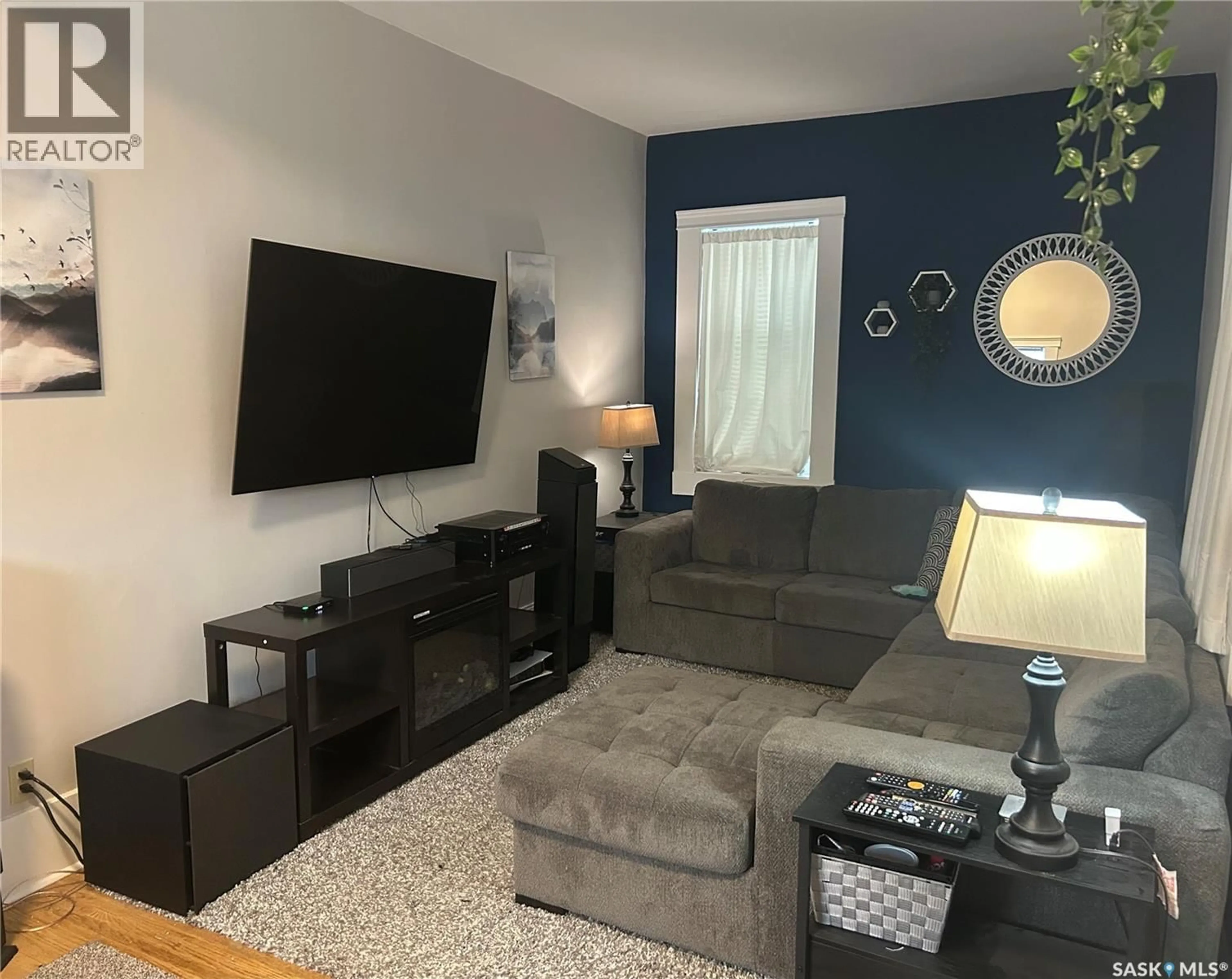 Living room with furniture, unknown for 379 STADACONA STREET E, Moose Jaw Saskatchewan S6H0J5