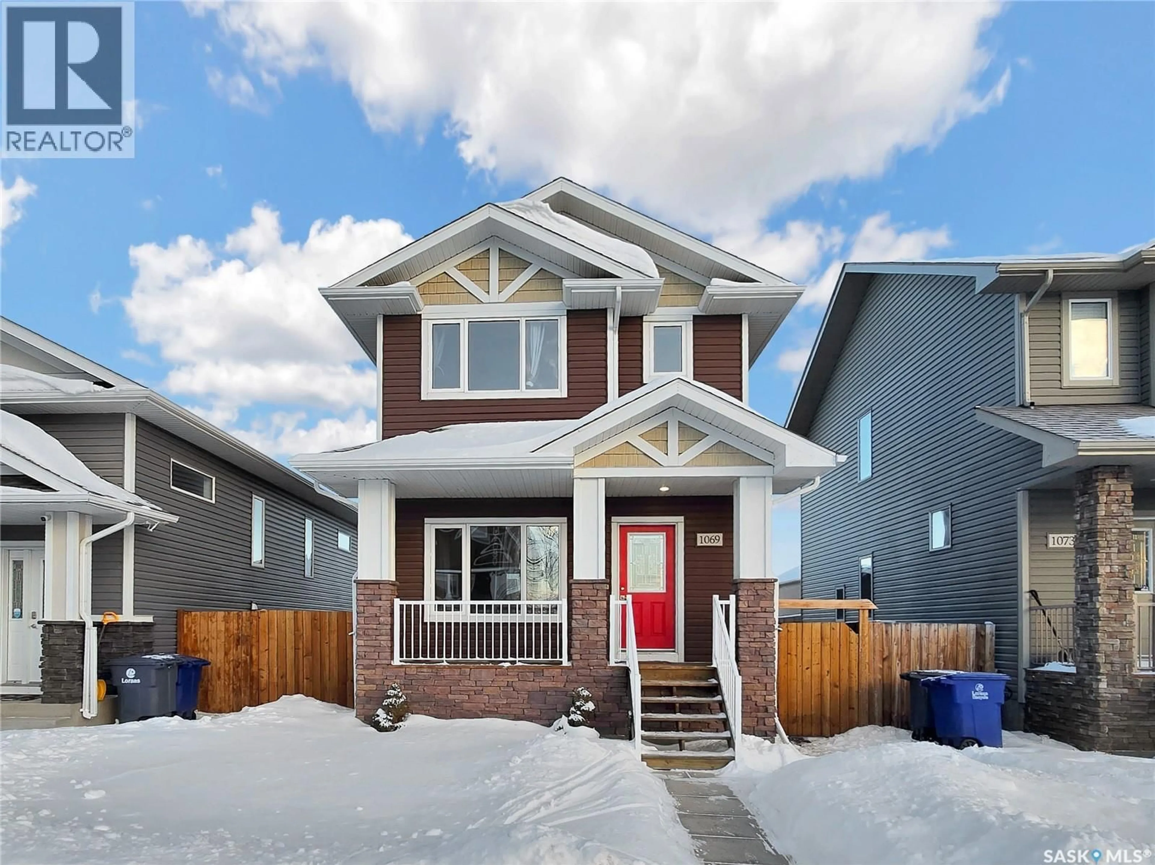 Home with vinyl exterior material, street for 1069 PARR HILL DRIVE, Martensville Saskatchewan S0K2T1