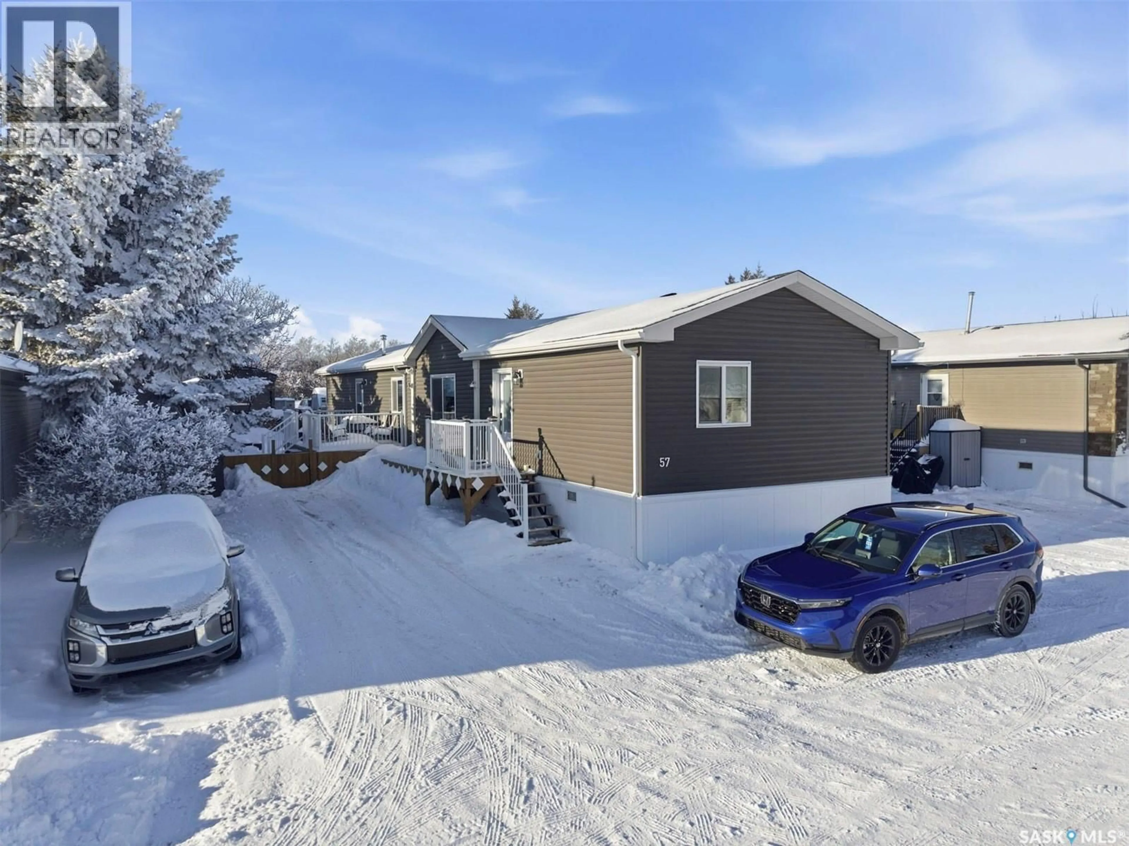 A pic from outside/outdoor area/front of a property/back of a property/a pic from drone, street for 57 MULBERRY ROAD, Blucher Rm No. 343 Saskatchewan S7B0A4