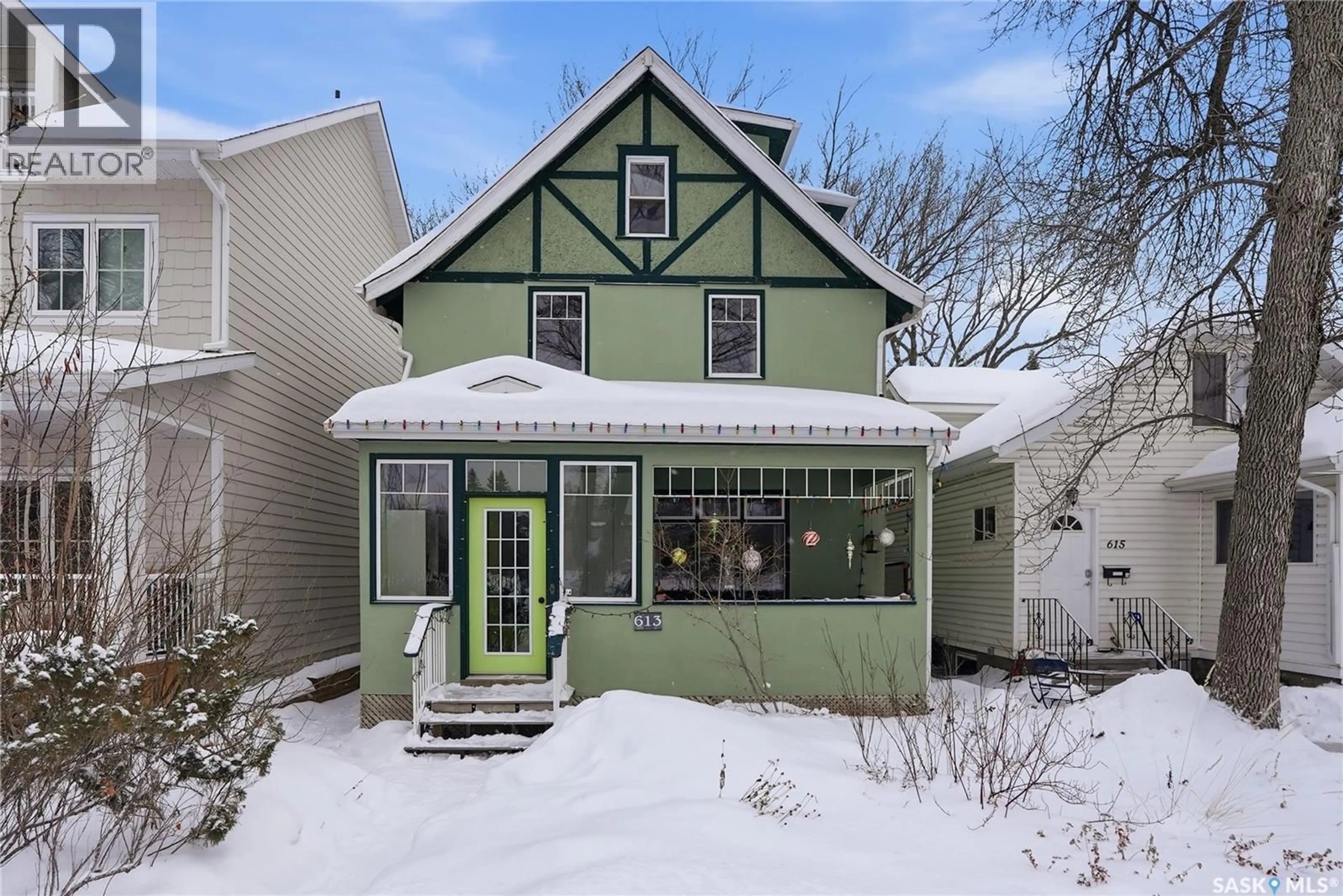 Home with vinyl exterior material, street for 613 DUFFERIN AVENUE, Saskatoon Saskatchewan S7N1C4