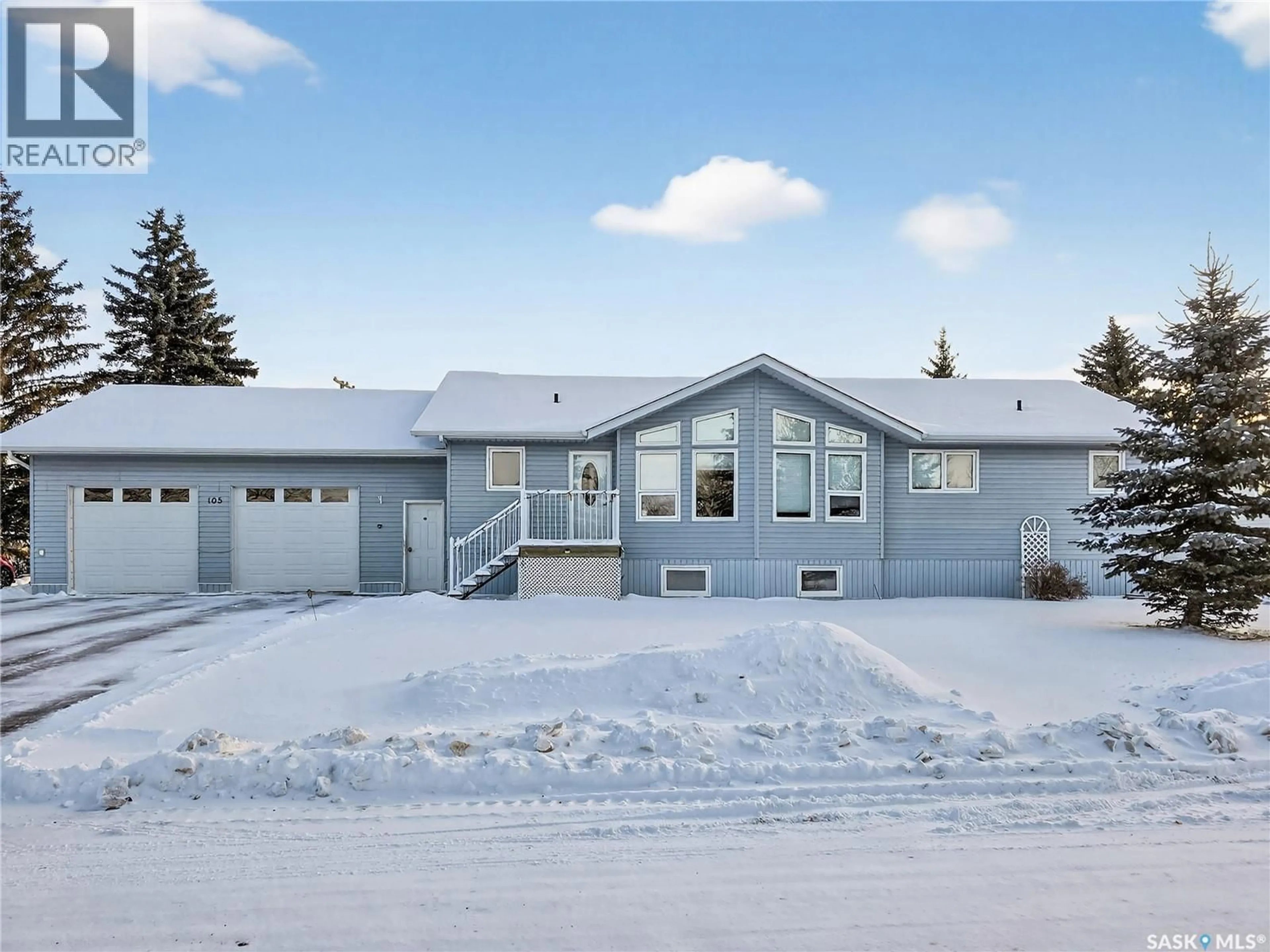 Home with vinyl exterior material, street for 105 NELSON AVENUE, Kipling Saskatchewan S0G2S0