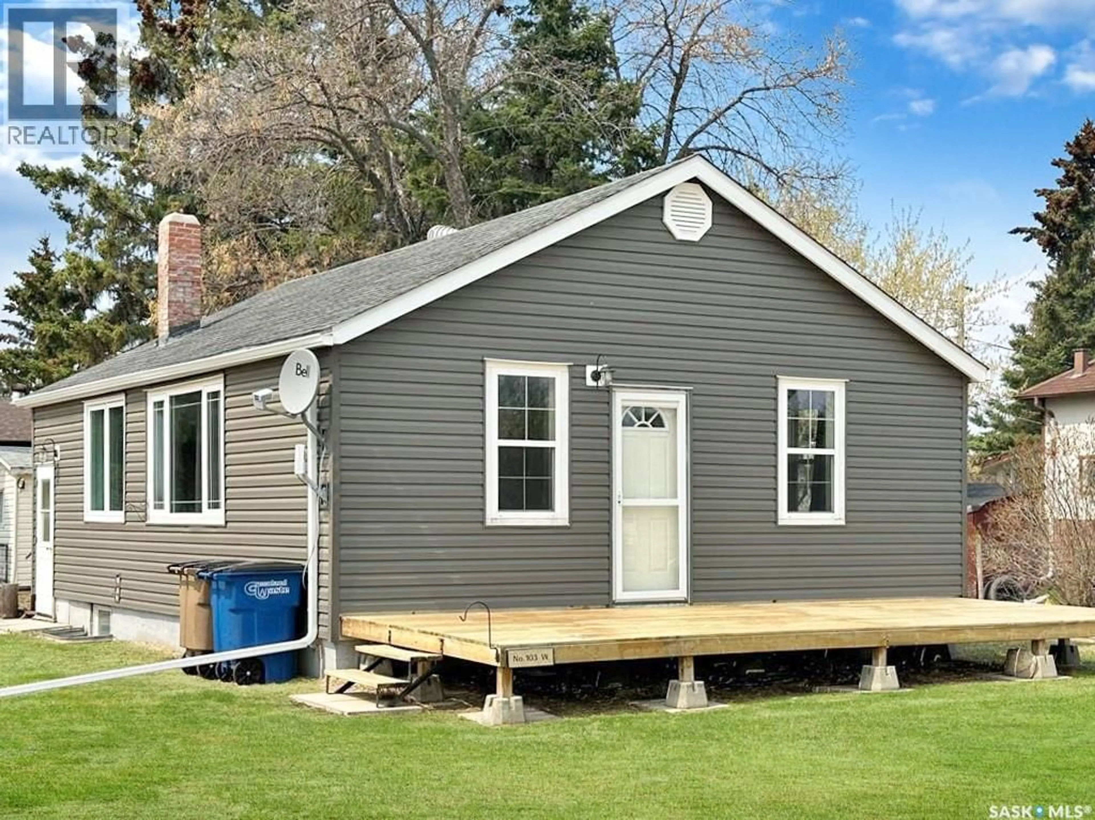 Home with vinyl exterior material, street for 103 1ST STREET, Meath Park Saskatchewan S0J1T0
