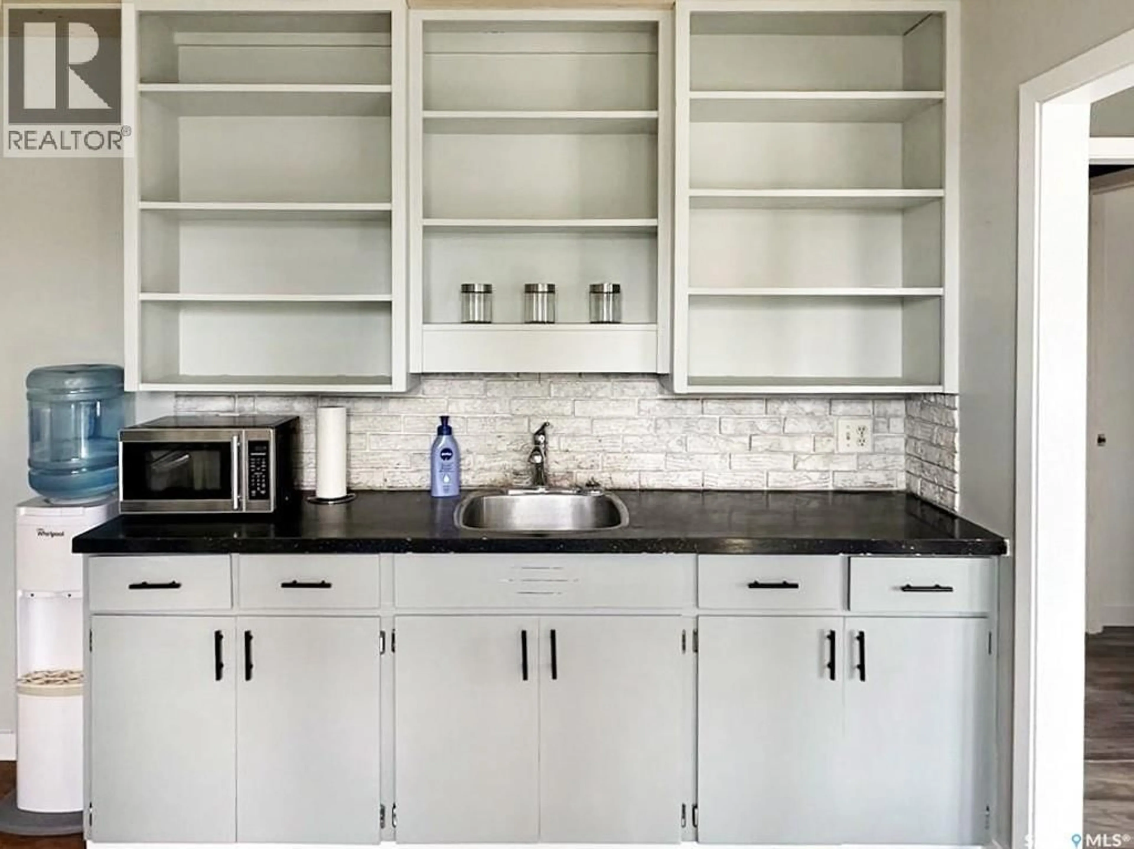 Contemporary kitchen, ceramic/tile floor for 103 1ST STREET, Meath Park Saskatchewan S0J1T0