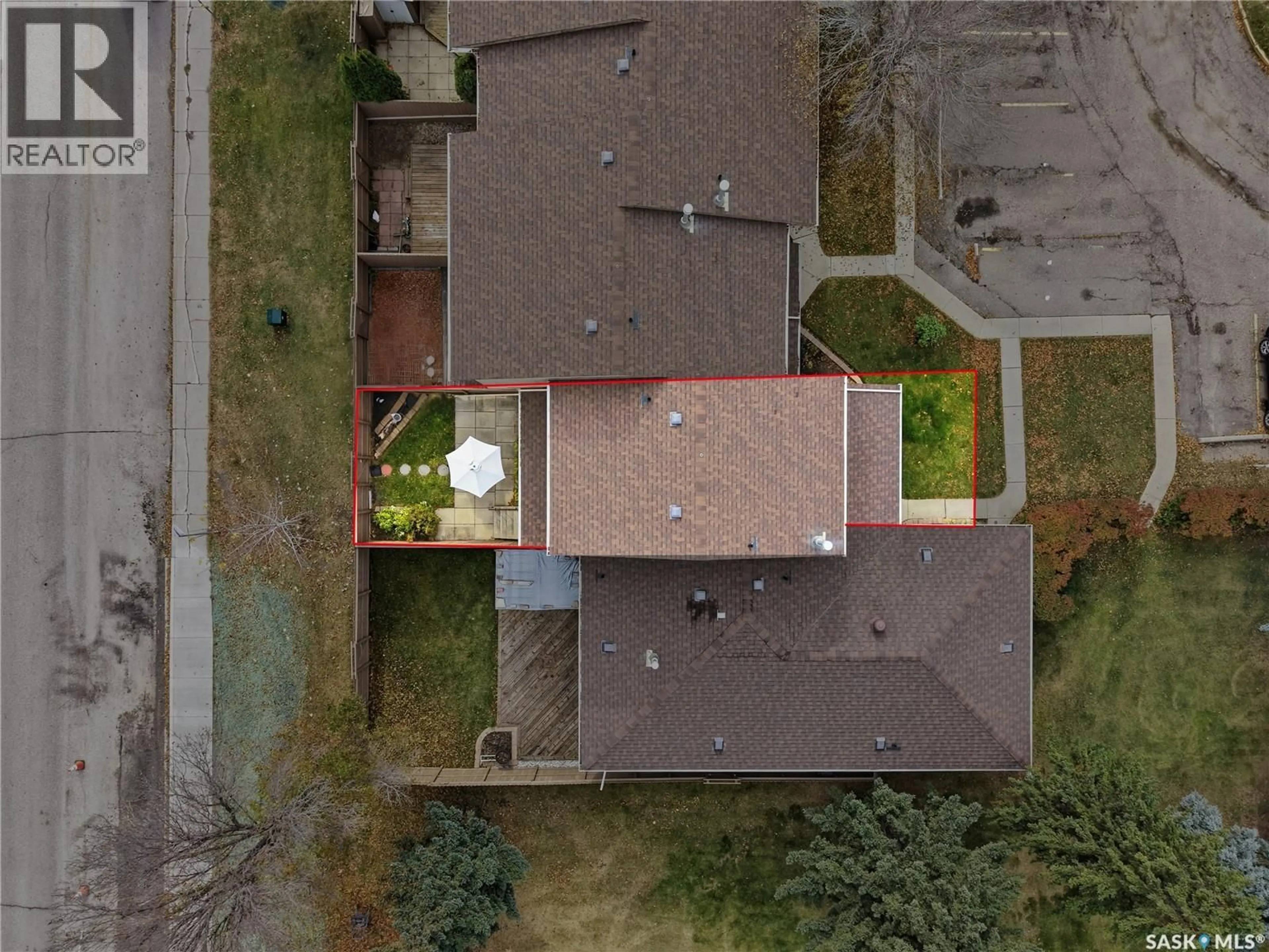 A pic from outside/outdoor area/front of a property/back of a property/a pic from drone, street for 106 - 1128 MCKERCHER DRIVE, Saskatoon Saskatchewan S7H4Y7