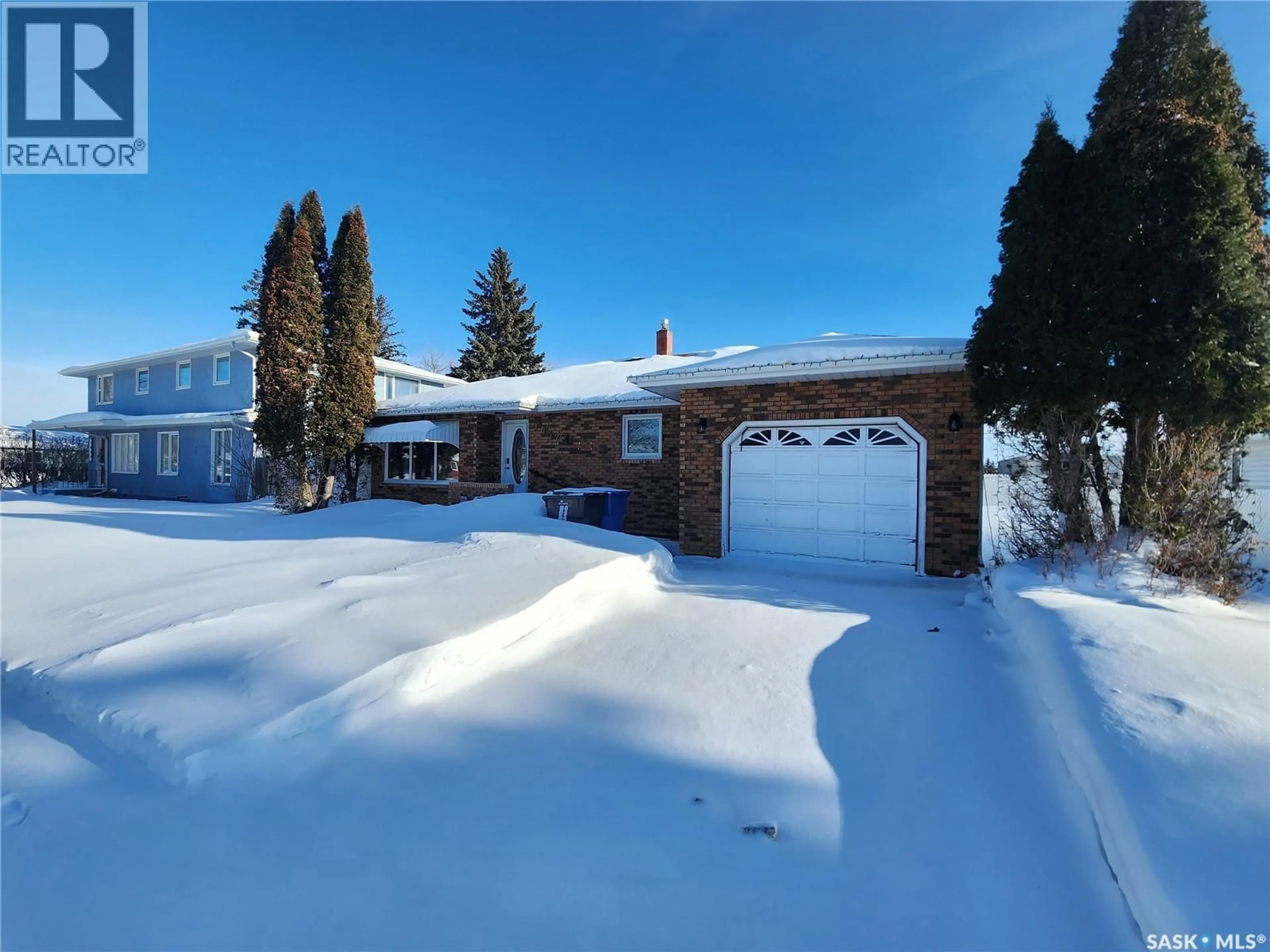 A pic from outside/outdoor area/front of a property/back of a property/a pic from drone, street for 1032 MAIN STREET, Melville Saskatchewan S0A2P0