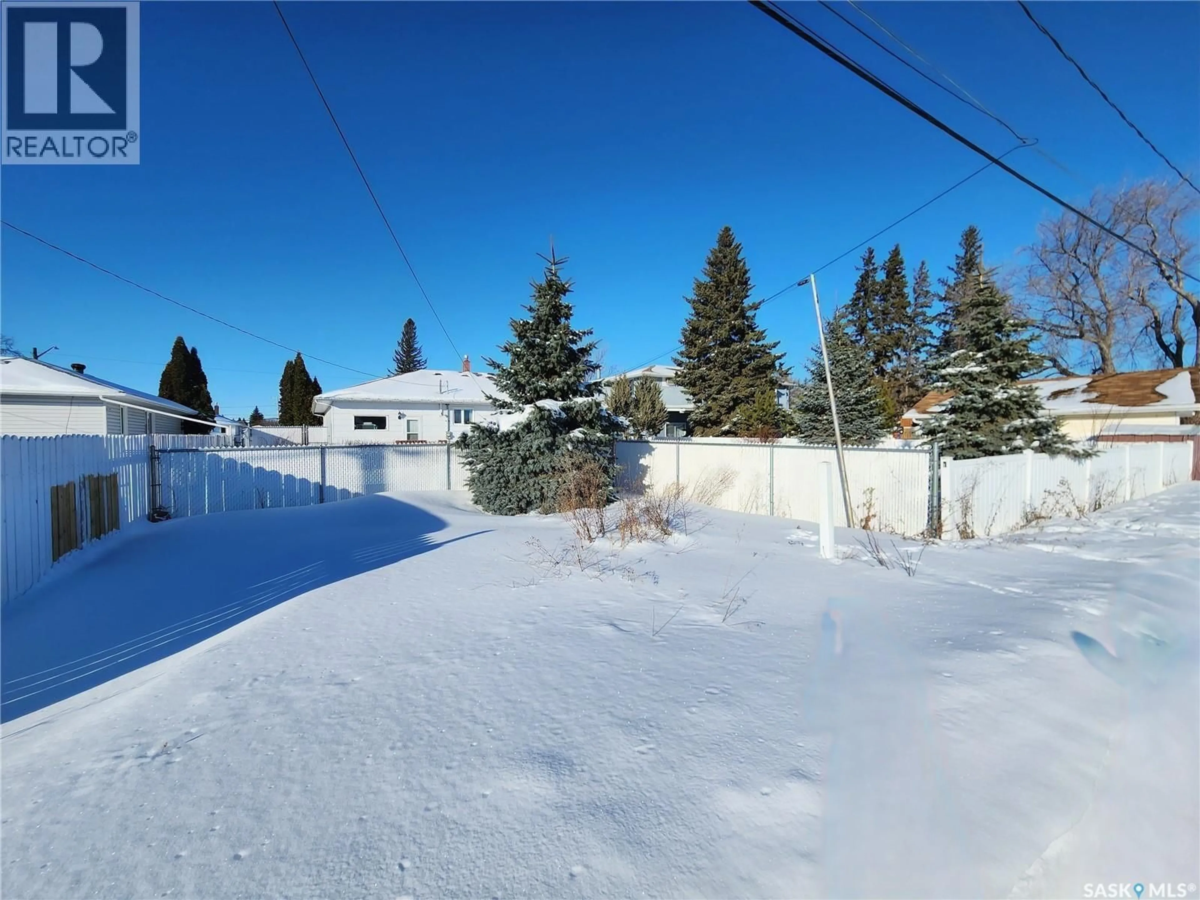 A pic from outside/outdoor area/front of a property/back of a property/a pic from drone, street for 1032 MAIN STREET, Melville Saskatchewan S0A2P0