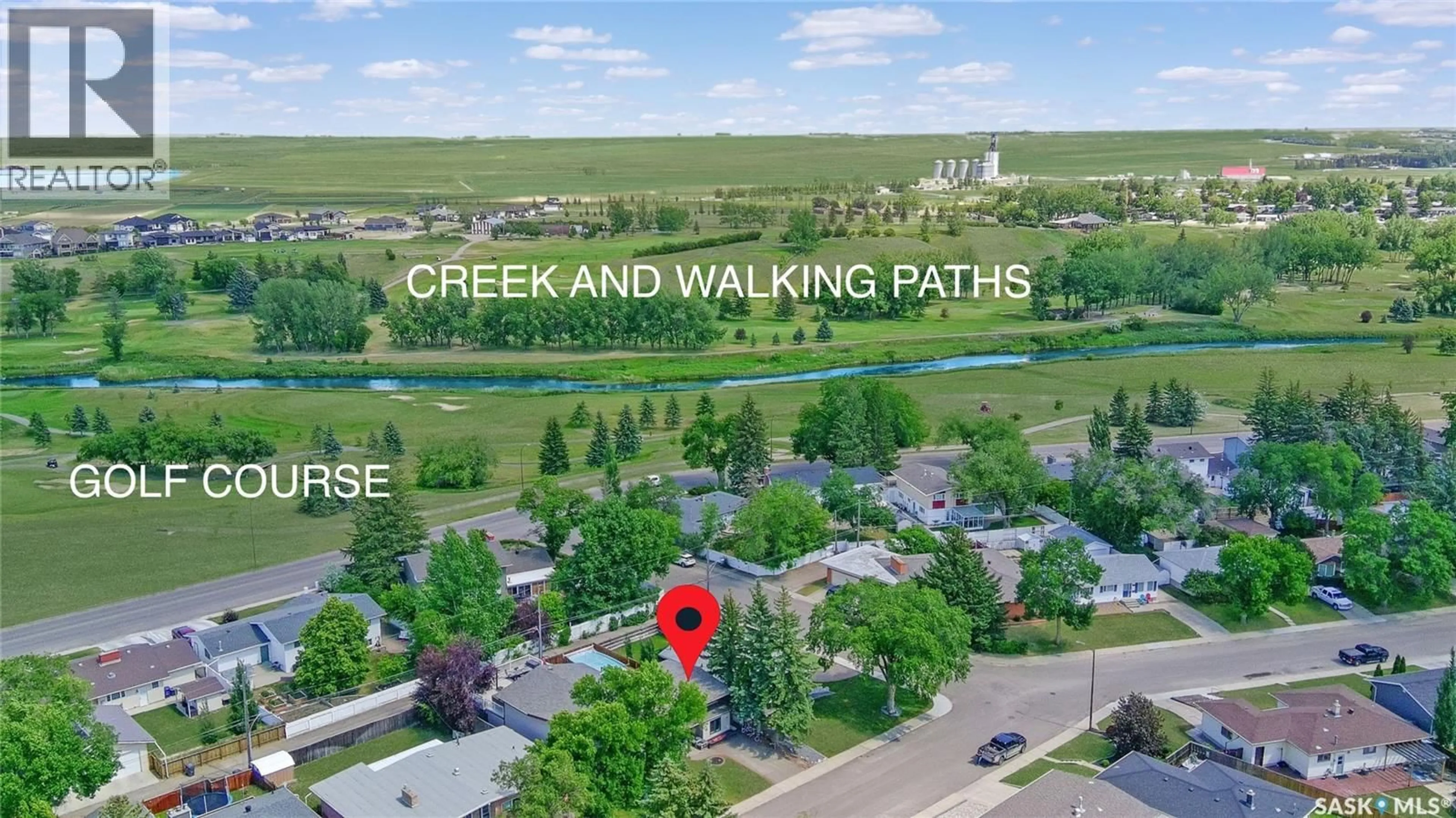 A pic from outside/outdoor area/front of a property/back of a property/a pic from drone, water/lake/river/ocean view for 1311 JUBILEE DRIVE, Swift Current Saskatchewan S9H2A5