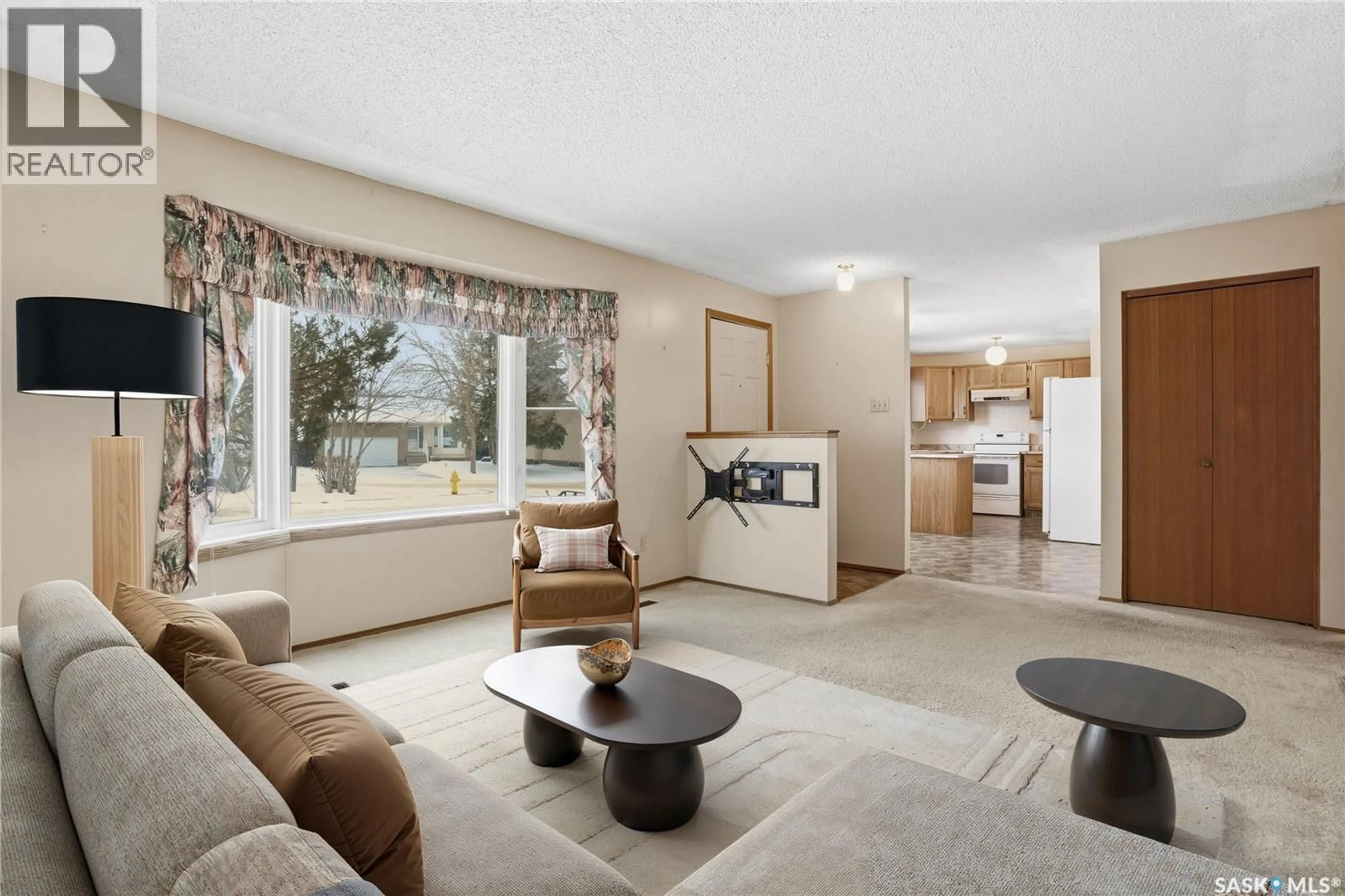 Living room with furniture, ceramic/tile floor for 986 GARRY STREET, Regina Saskatchewan S4X2N1