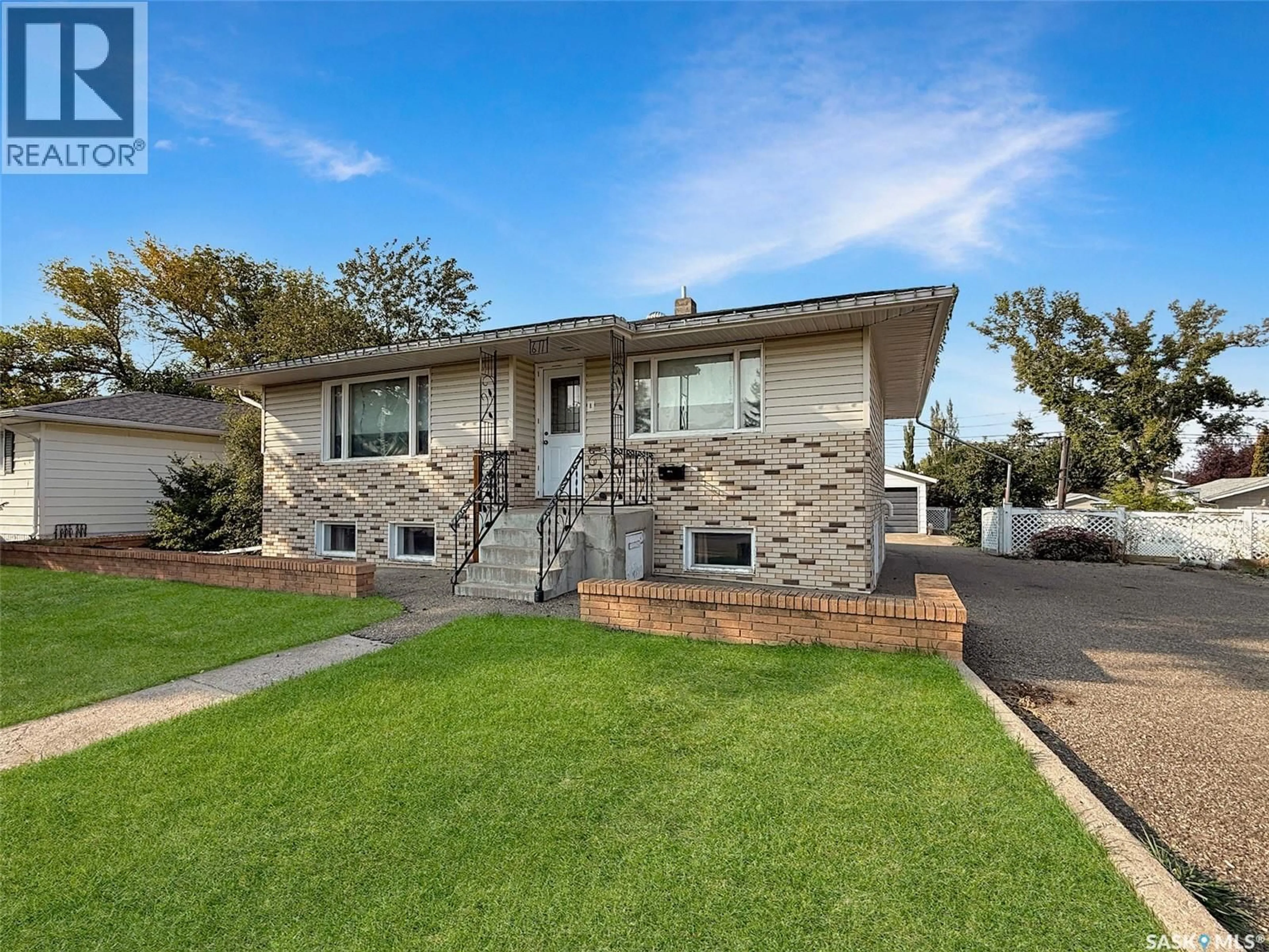 Home with brick exterior material, street for 611 NORTH HILL DRIVE, Swift Current Saskatchewan S9H1X3