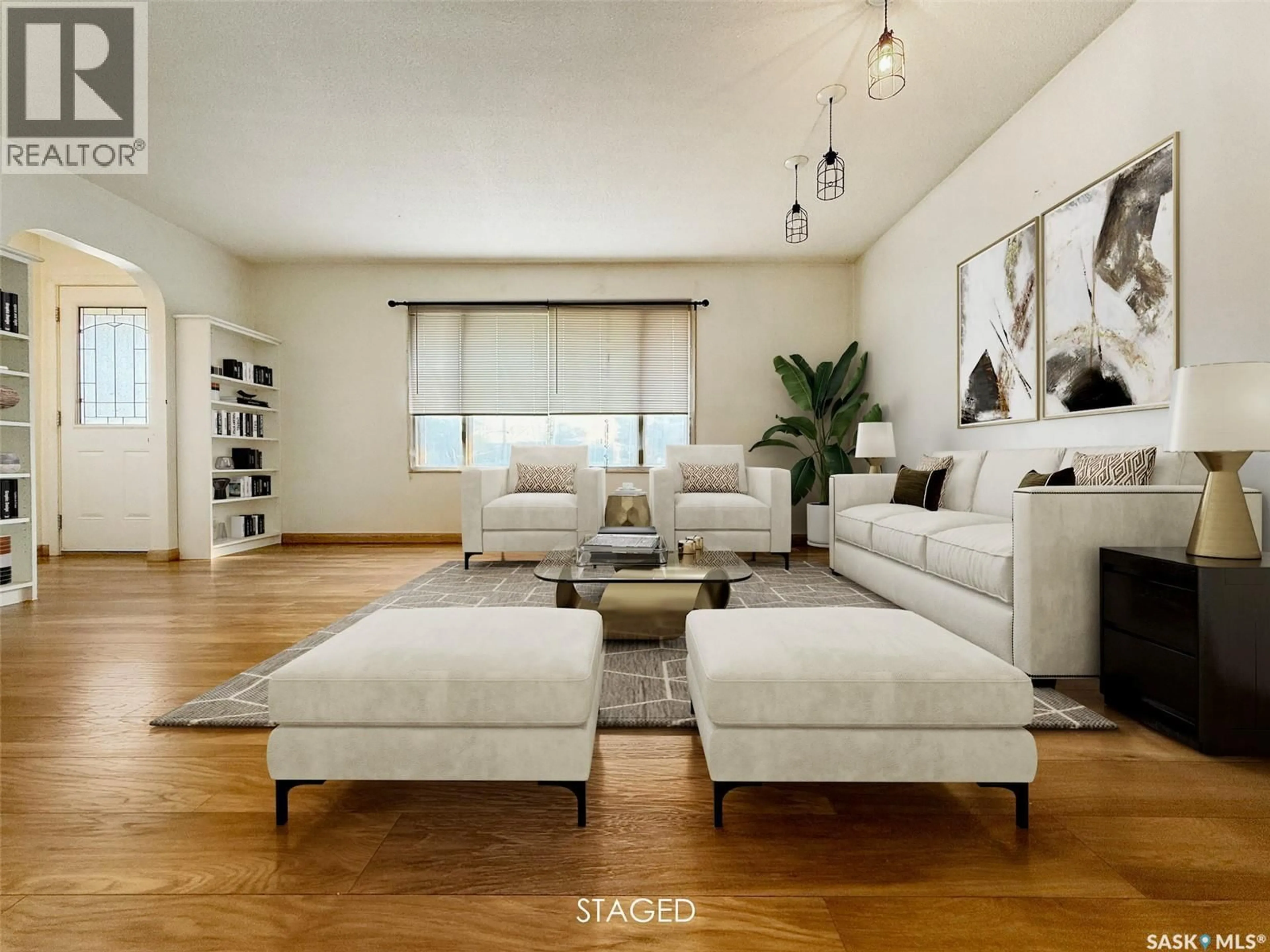 Living room with furniture, wood/laminate floor for 611 NORTH HILL DRIVE, Swift Current Saskatchewan S9H1X3